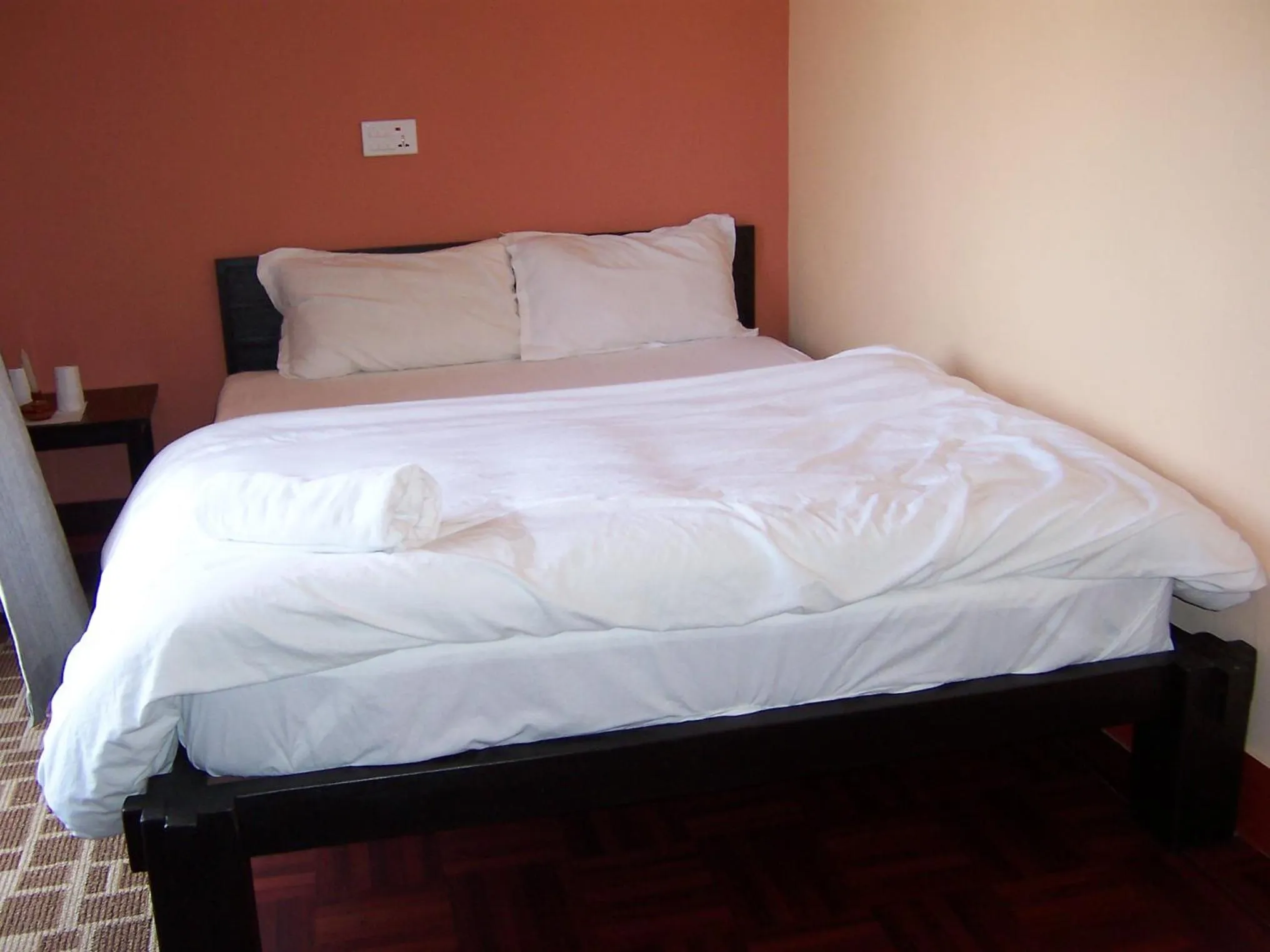 Bed in Bandipur Kaushi Inn