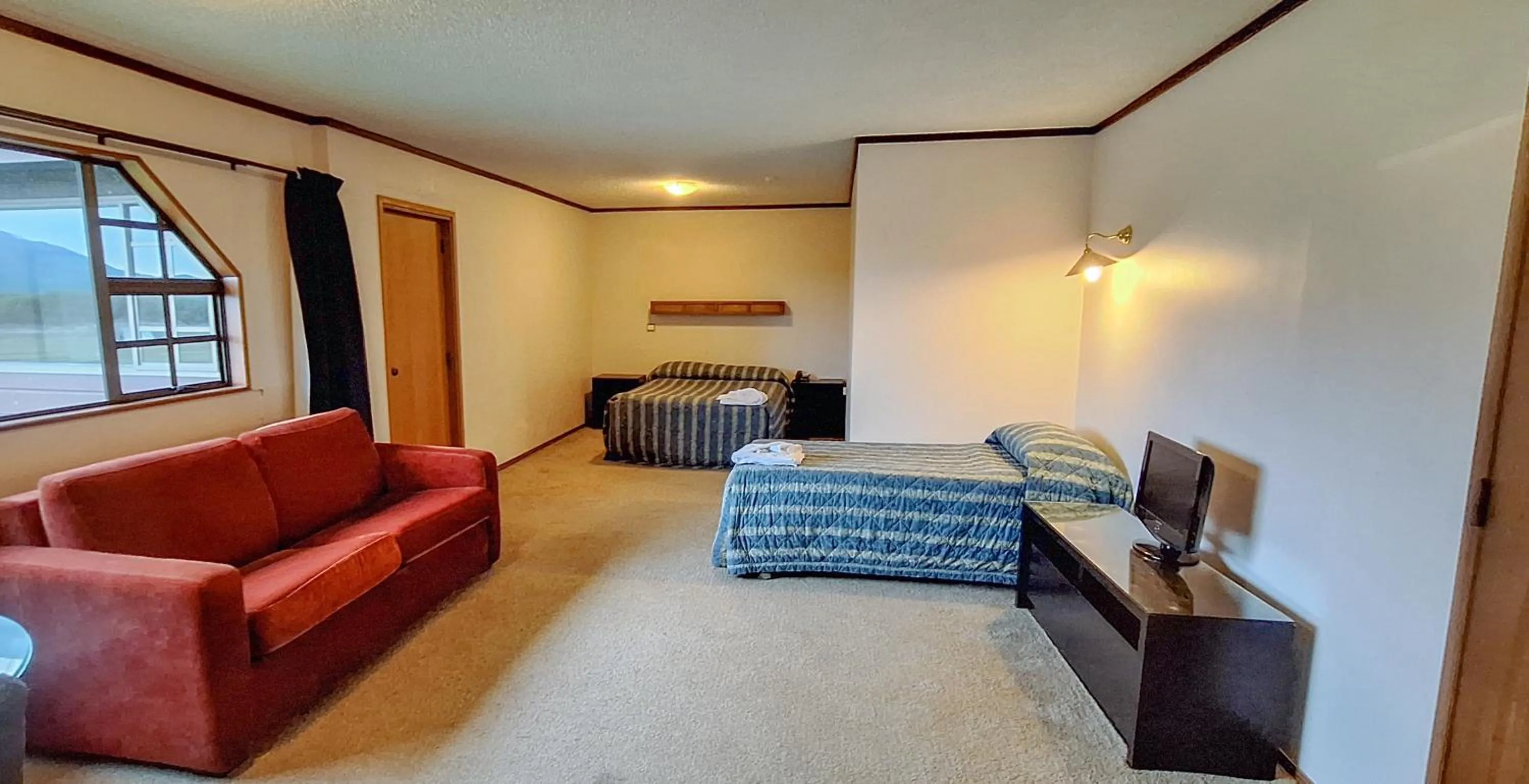 Bed in Discovery Countrytime Hotel