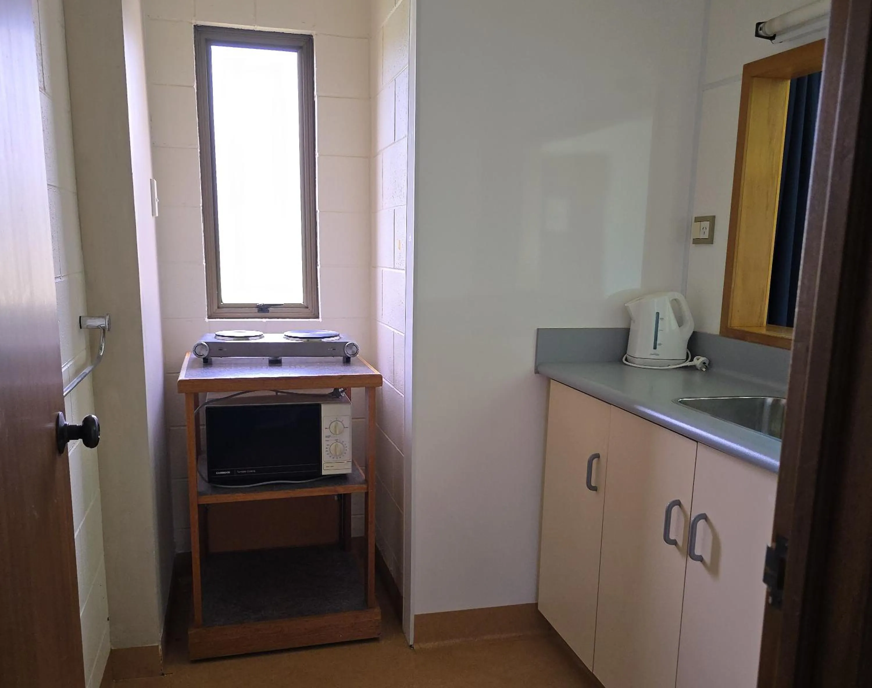 Kitchen or kitchenette in Discovery Countrytime Hotel