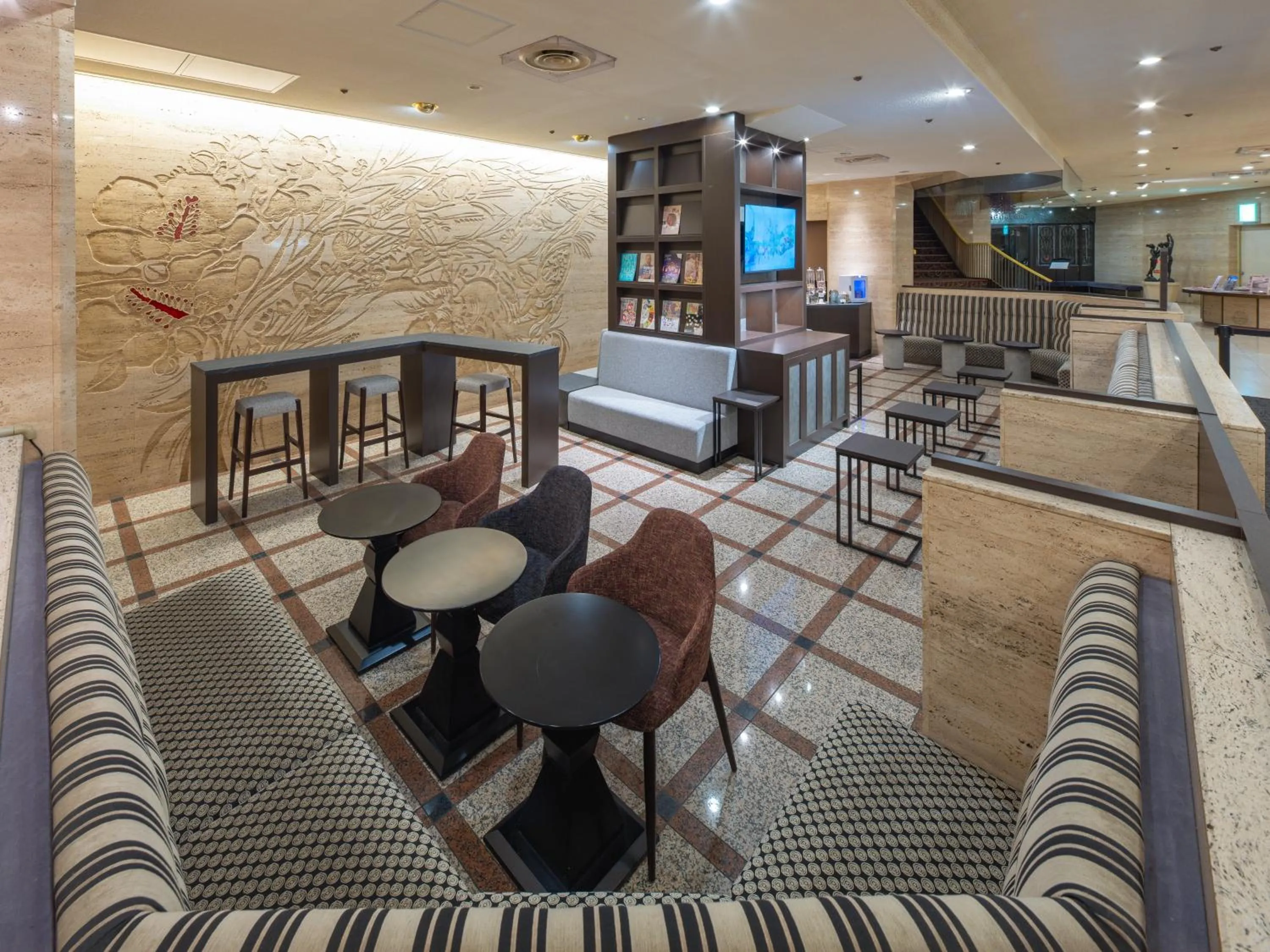 Communal lounge/ TV room in New Osaka Hotel