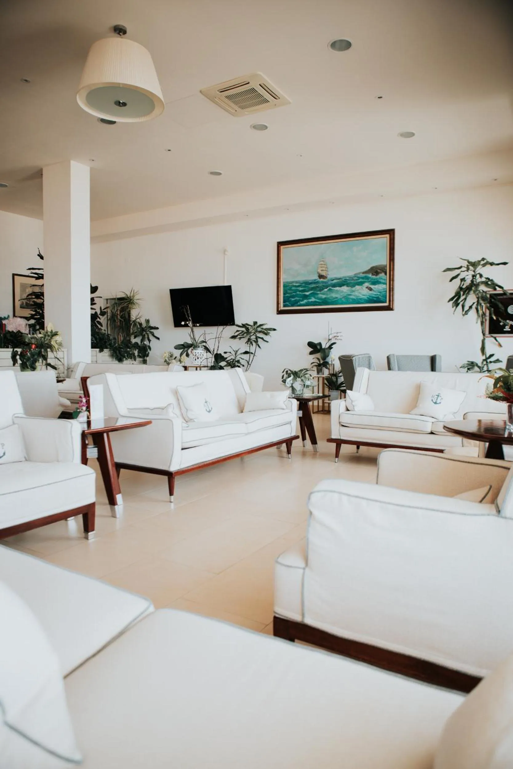 Communal lounge/ TV room in Hotel Parrini