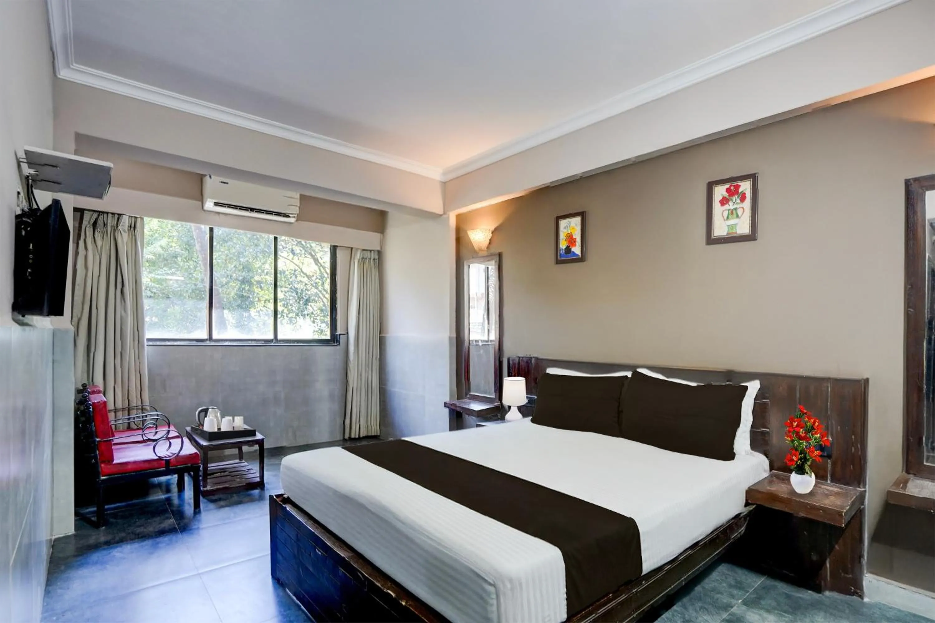Bedroom, Bed in Super Hotel O Calangute-Baga Crossway Formerly Rustic Village