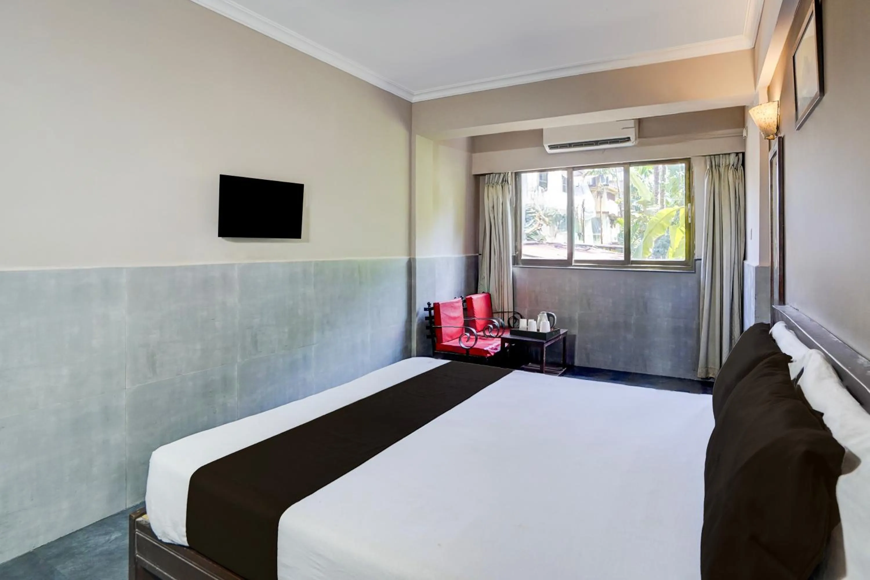 Bedroom, Bed in Super Hotel O Calangute-Baga Crossway Formerly Rustic Village