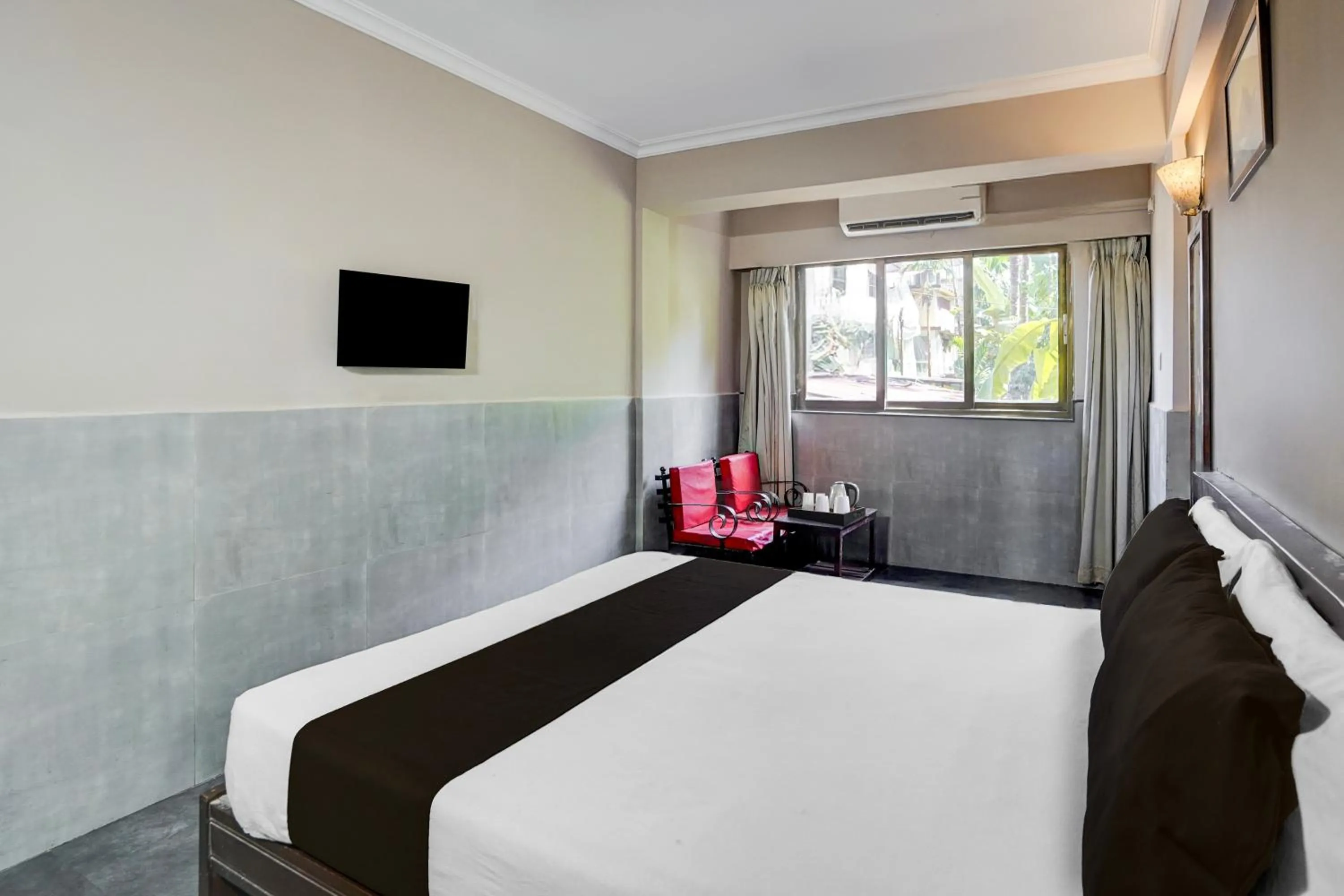 Bedroom, Bed in Super Hotel O Calangute-Baga Crossway Formerly Rustic Village