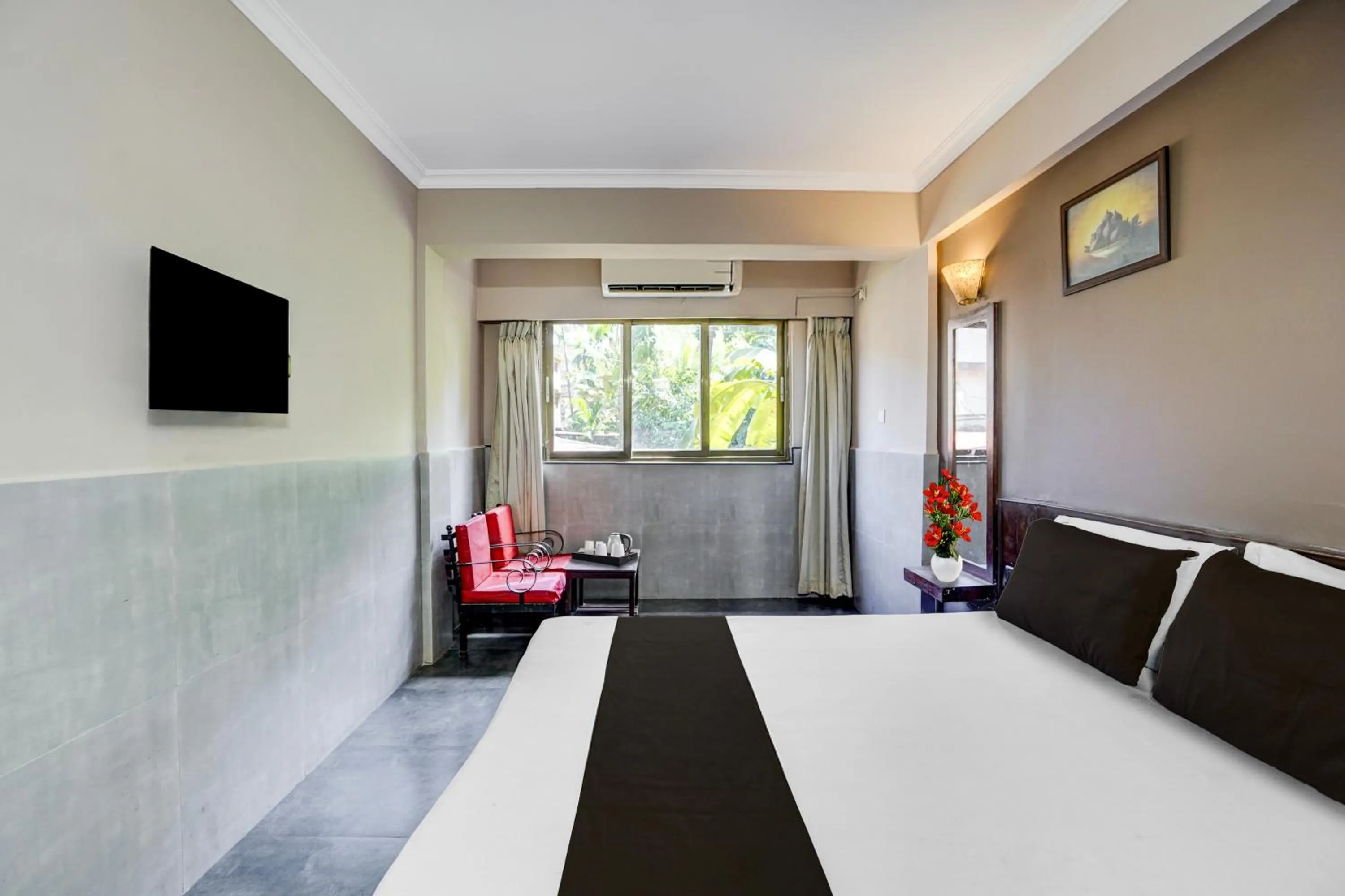Bedroom, Bed in Super Hotel O Calangute-Baga Crossway Formerly Rustic Village