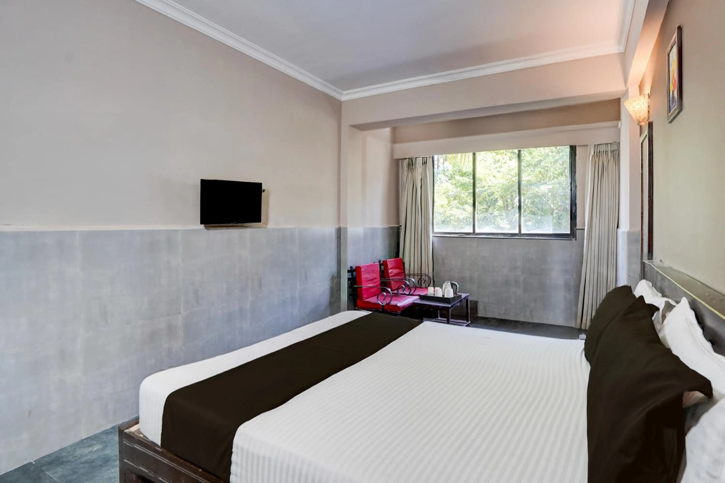 Bedroom, Bed in Super Hotel O Calangute-Baga Crossway Formerly Rustic Village