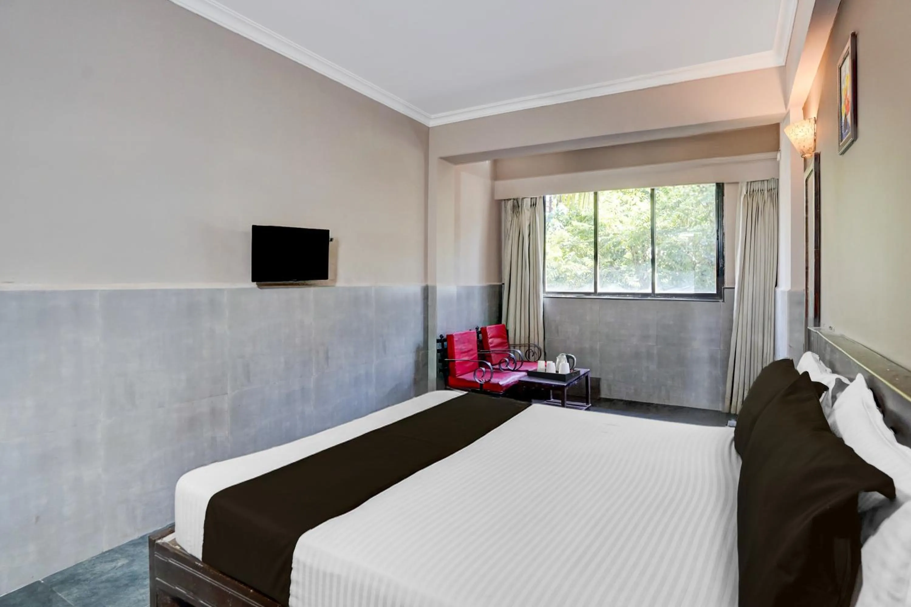 Bedroom, Bed in Super Hotel O Calangute-Baga Crossway Formerly Rustic Village