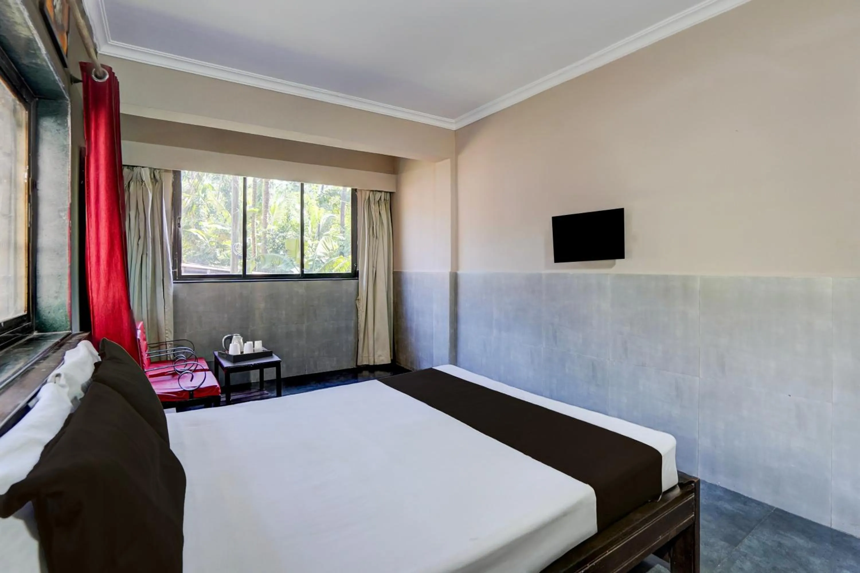Bedroom, Bed in Super Hotel O Calangute-Baga Crossway Formerly Rustic Village