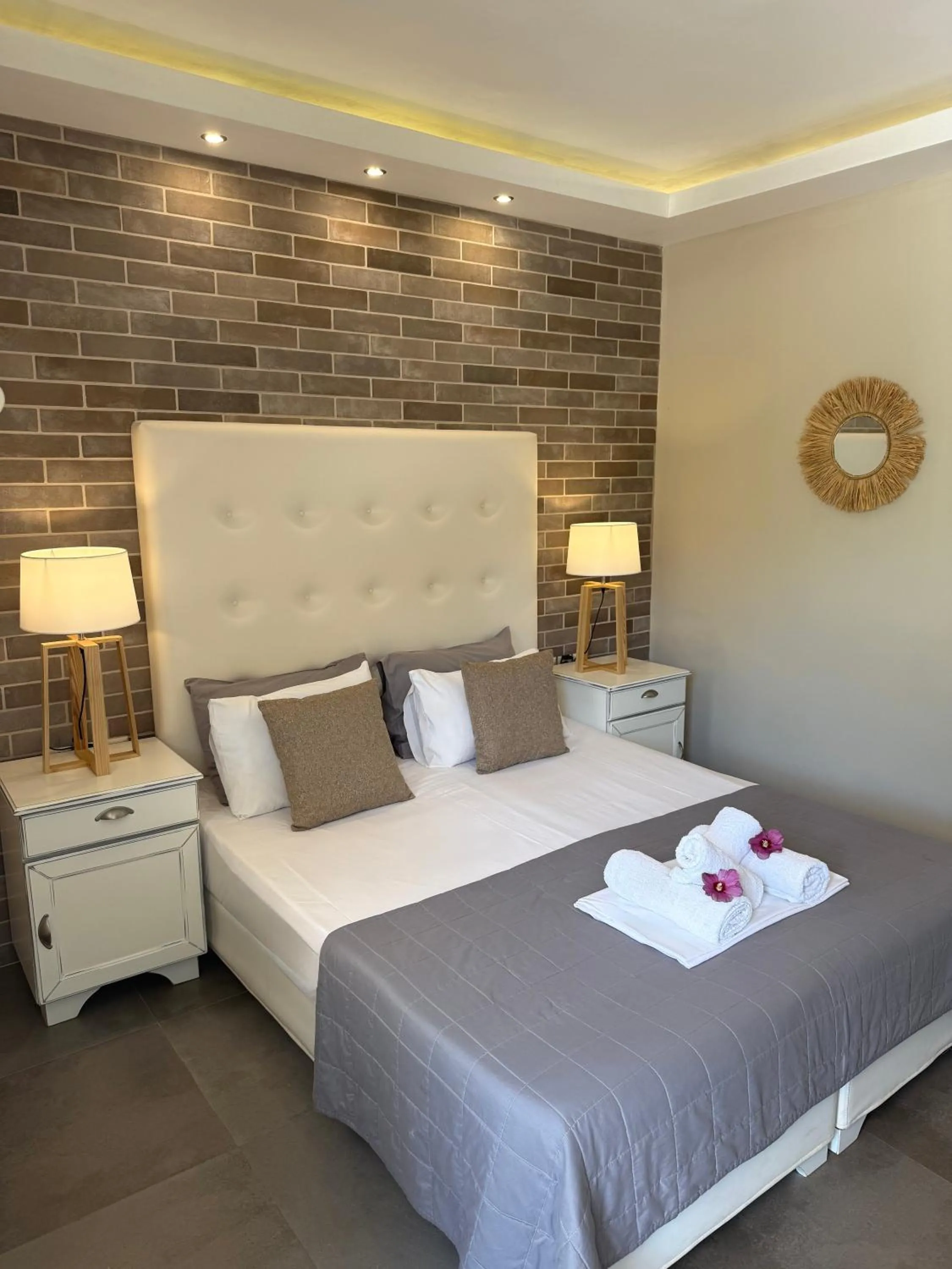 Bed in Aroma Beach Bungalows