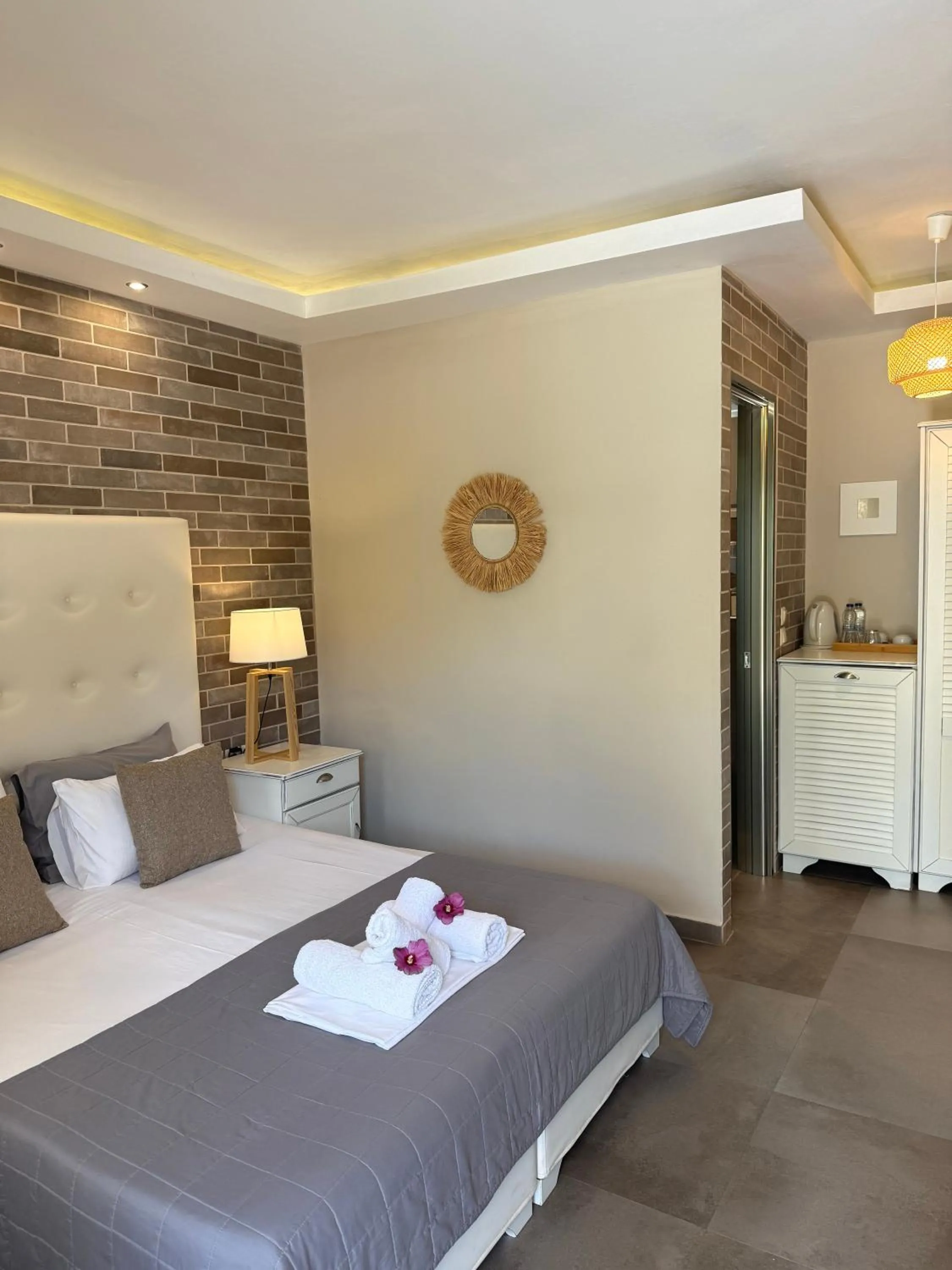Bed in Aroma Beach Bungalows
