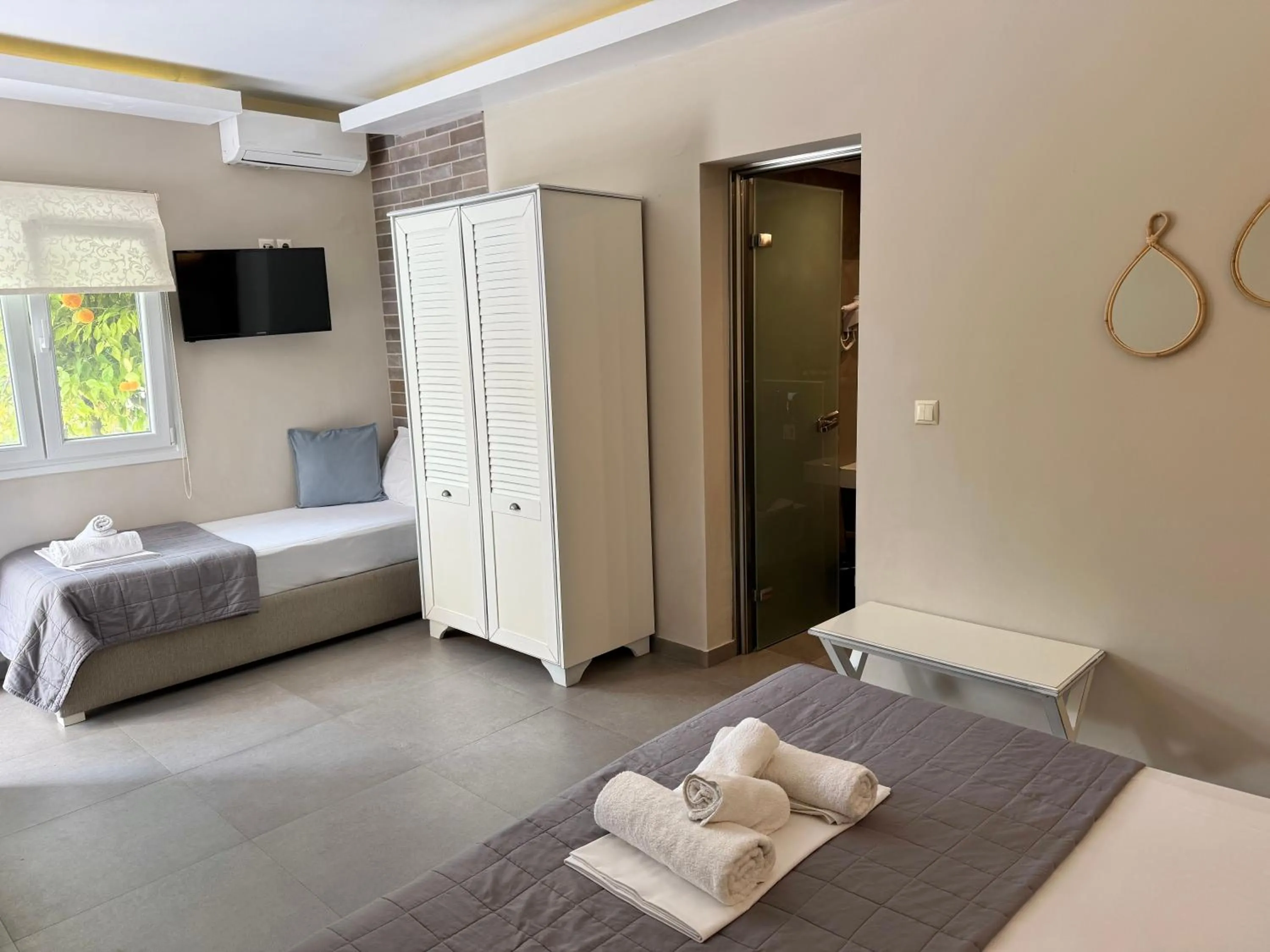 Bed in Aroma Beach Bungalows