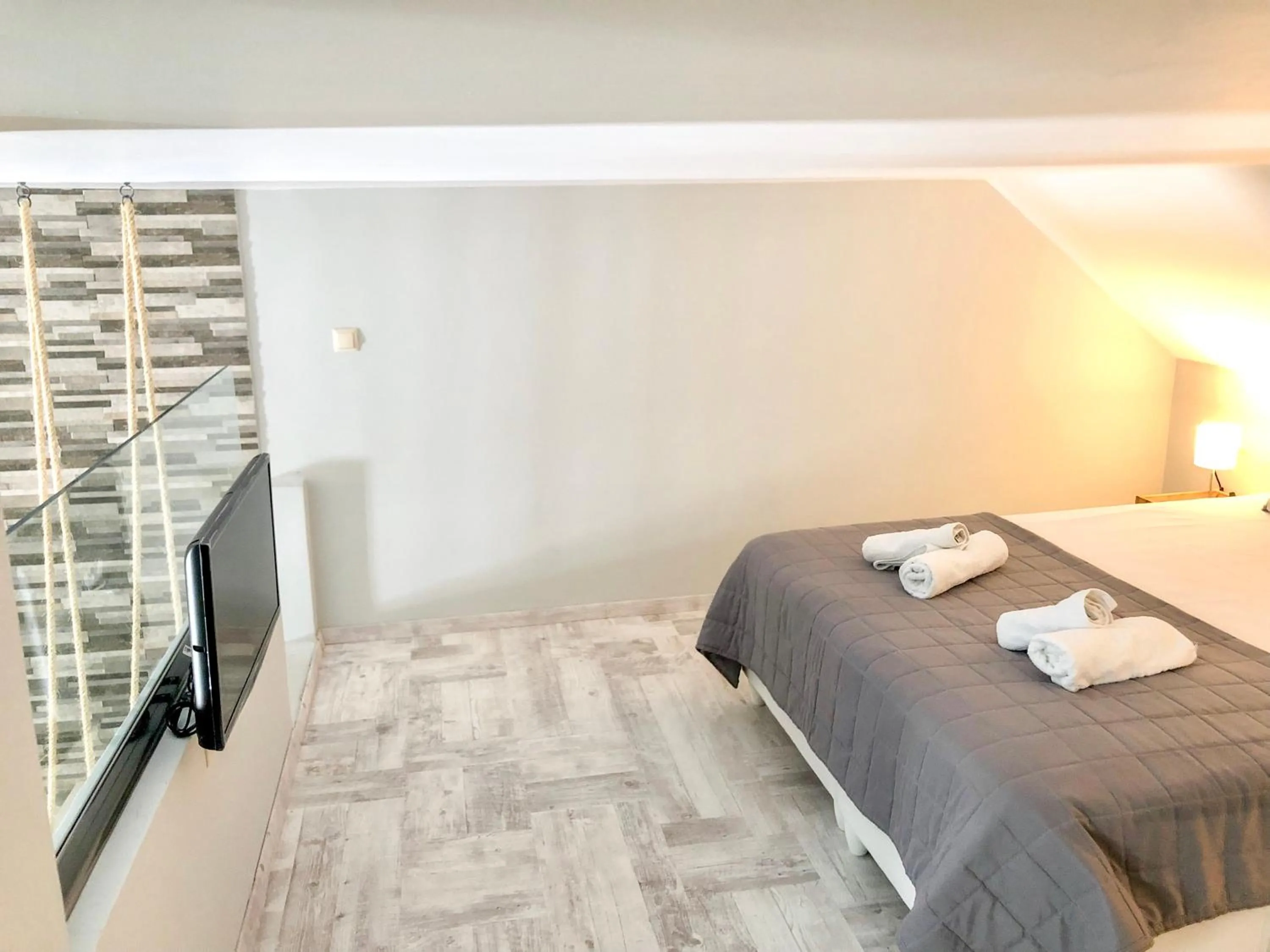 Bed in Aroma Beach Bungalows