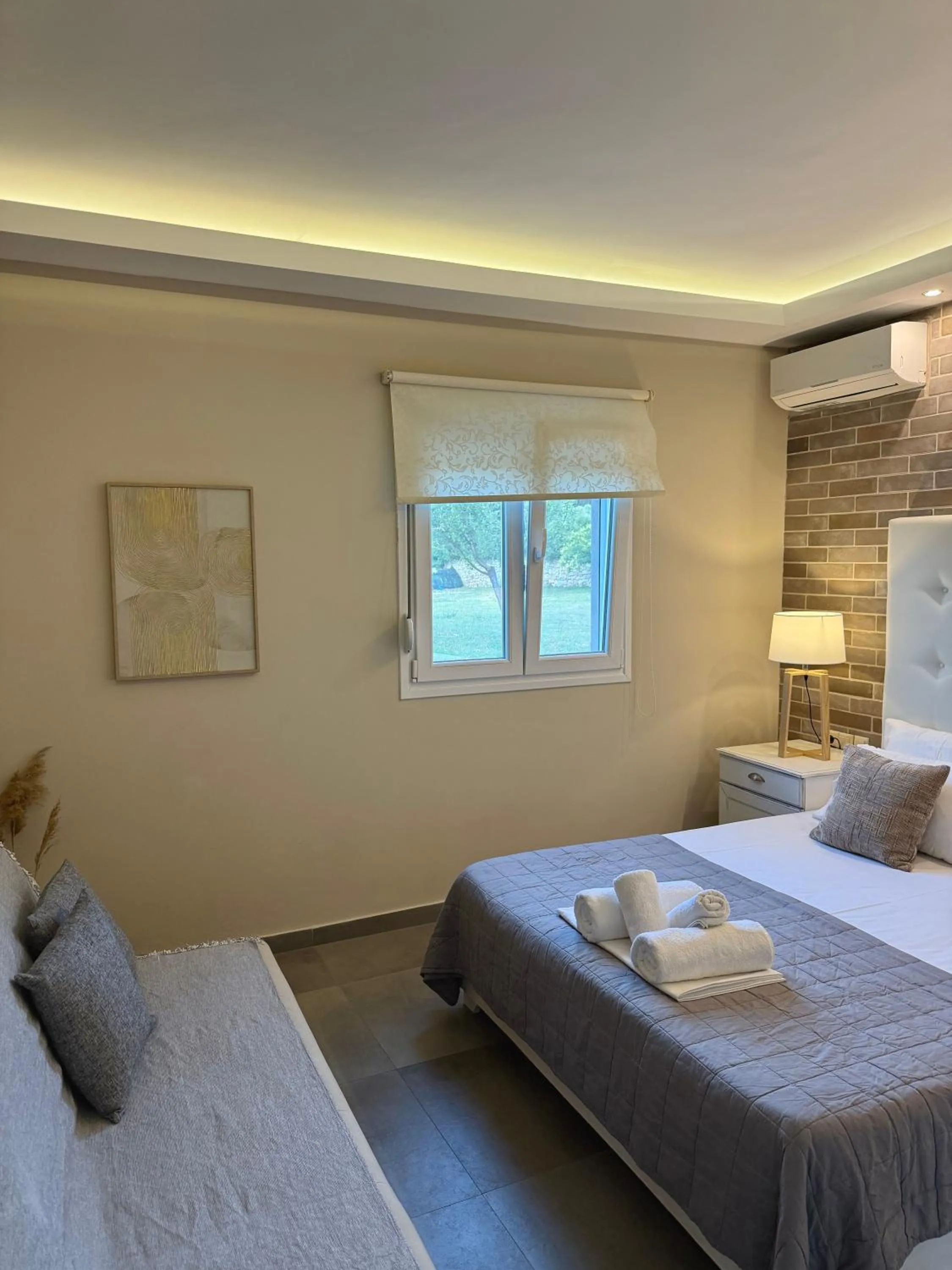 Bed in Aroma Beach Bungalows