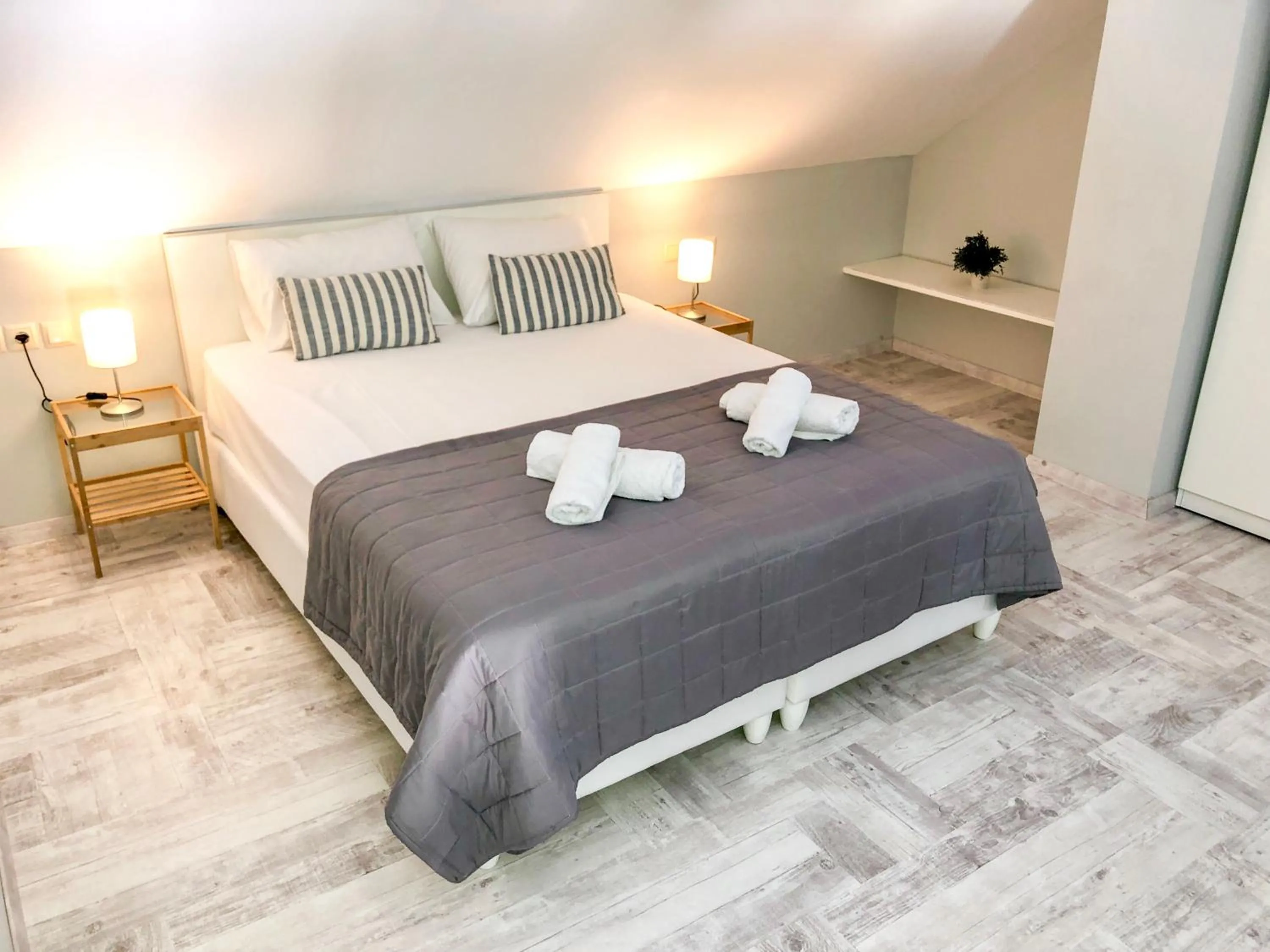 Bed in Aroma Beach Bungalows