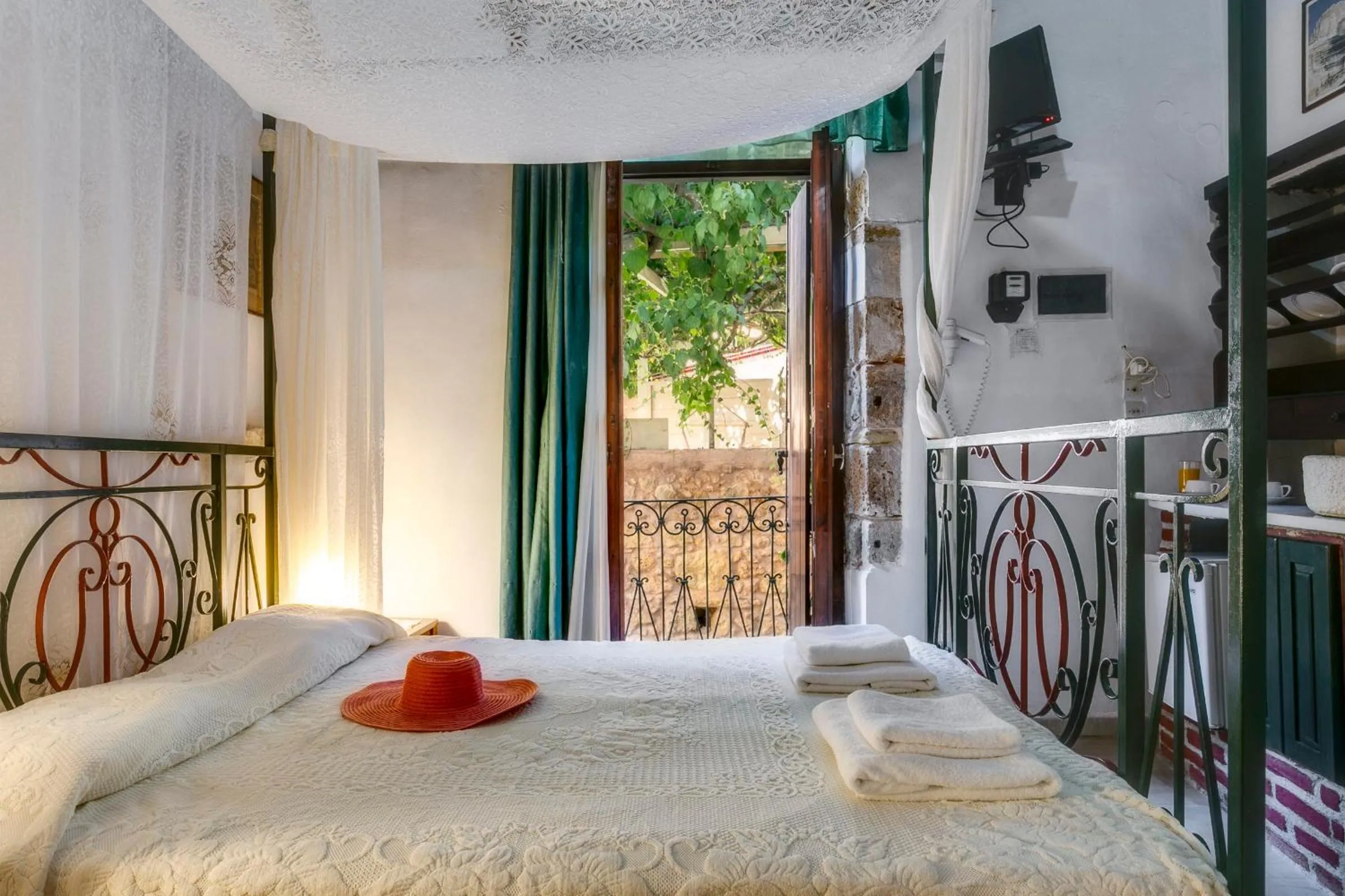 Bed in Ifigenia Rooms