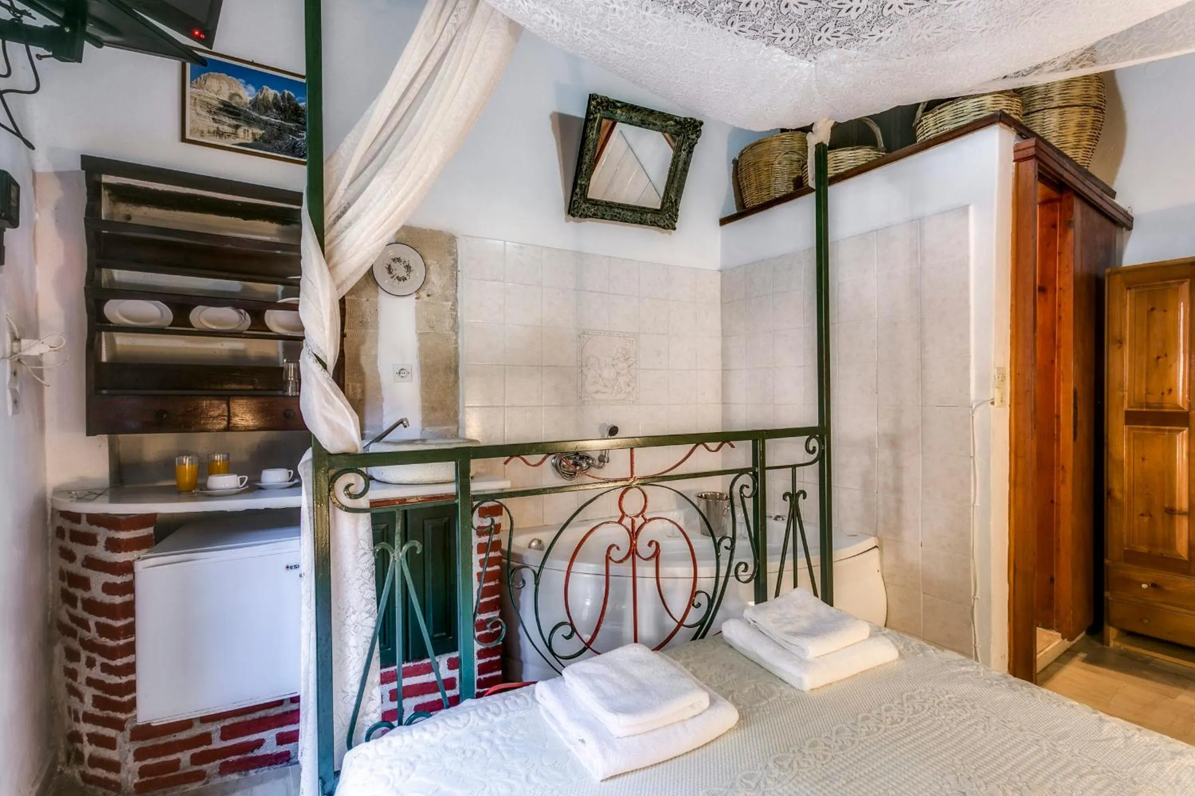 Bed in Ifigenia Rooms