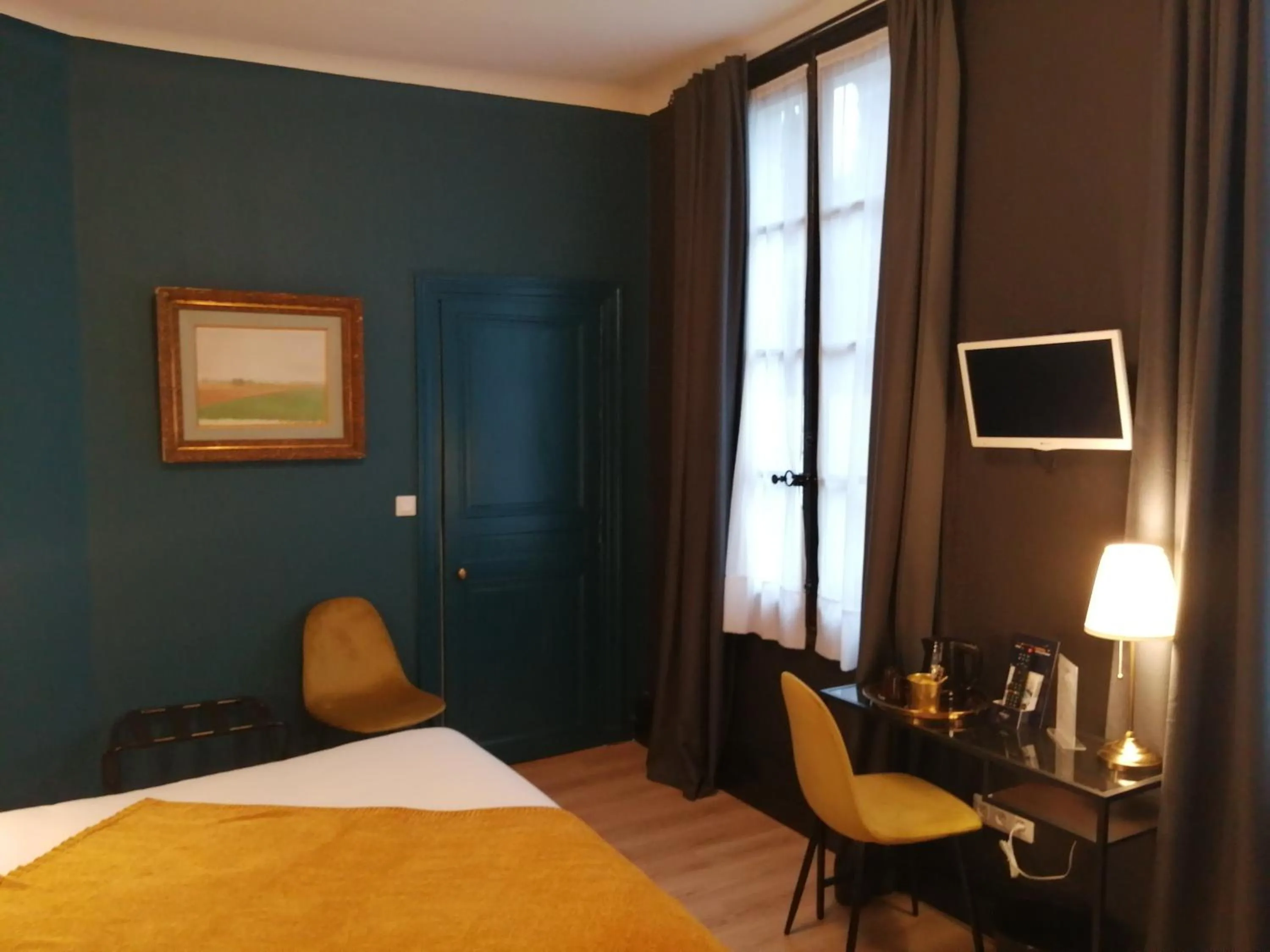 Decorative detail, Bed in Hotel Du Cygne Tours