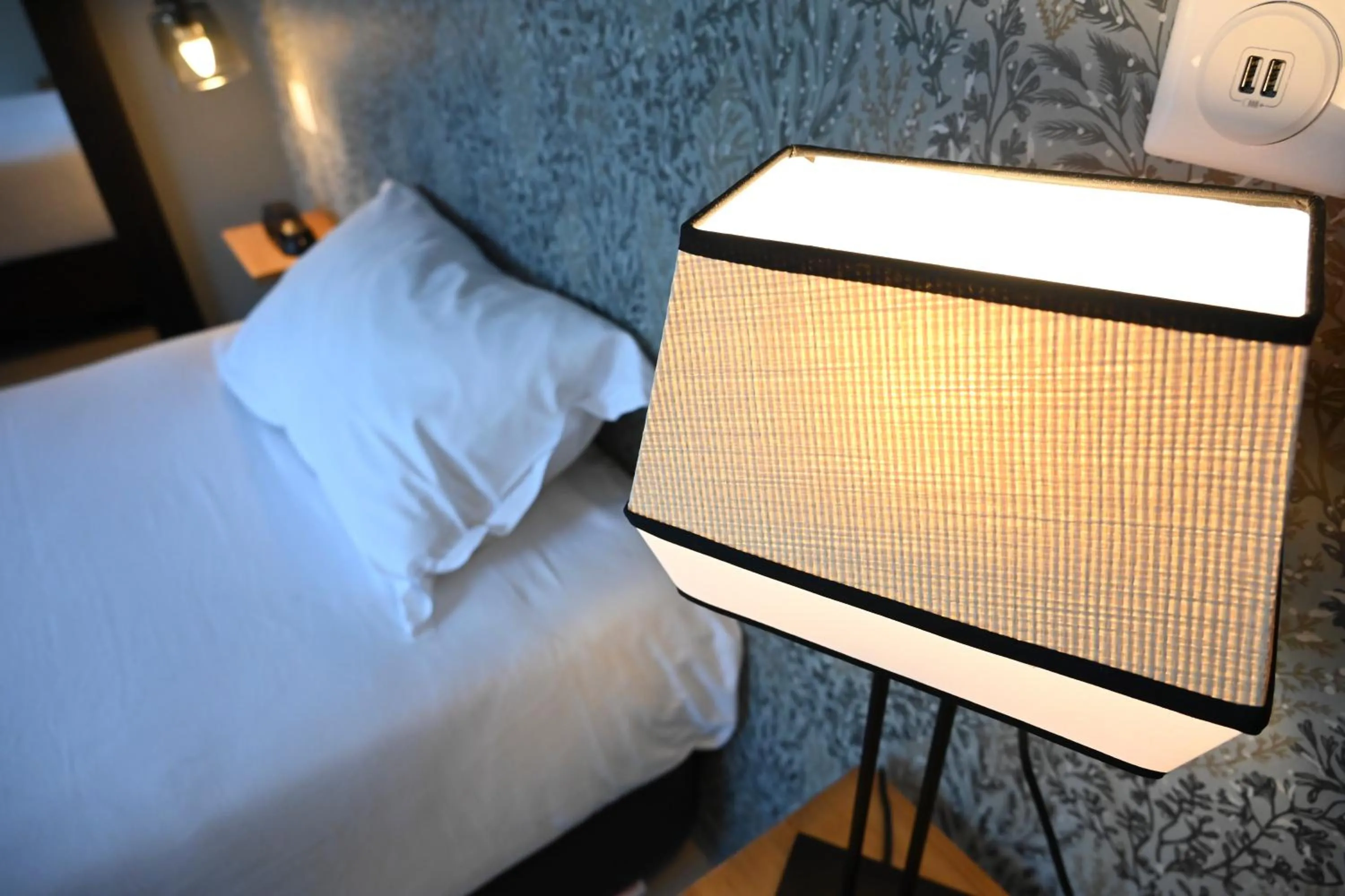 Bed in Hôtel Les Muses