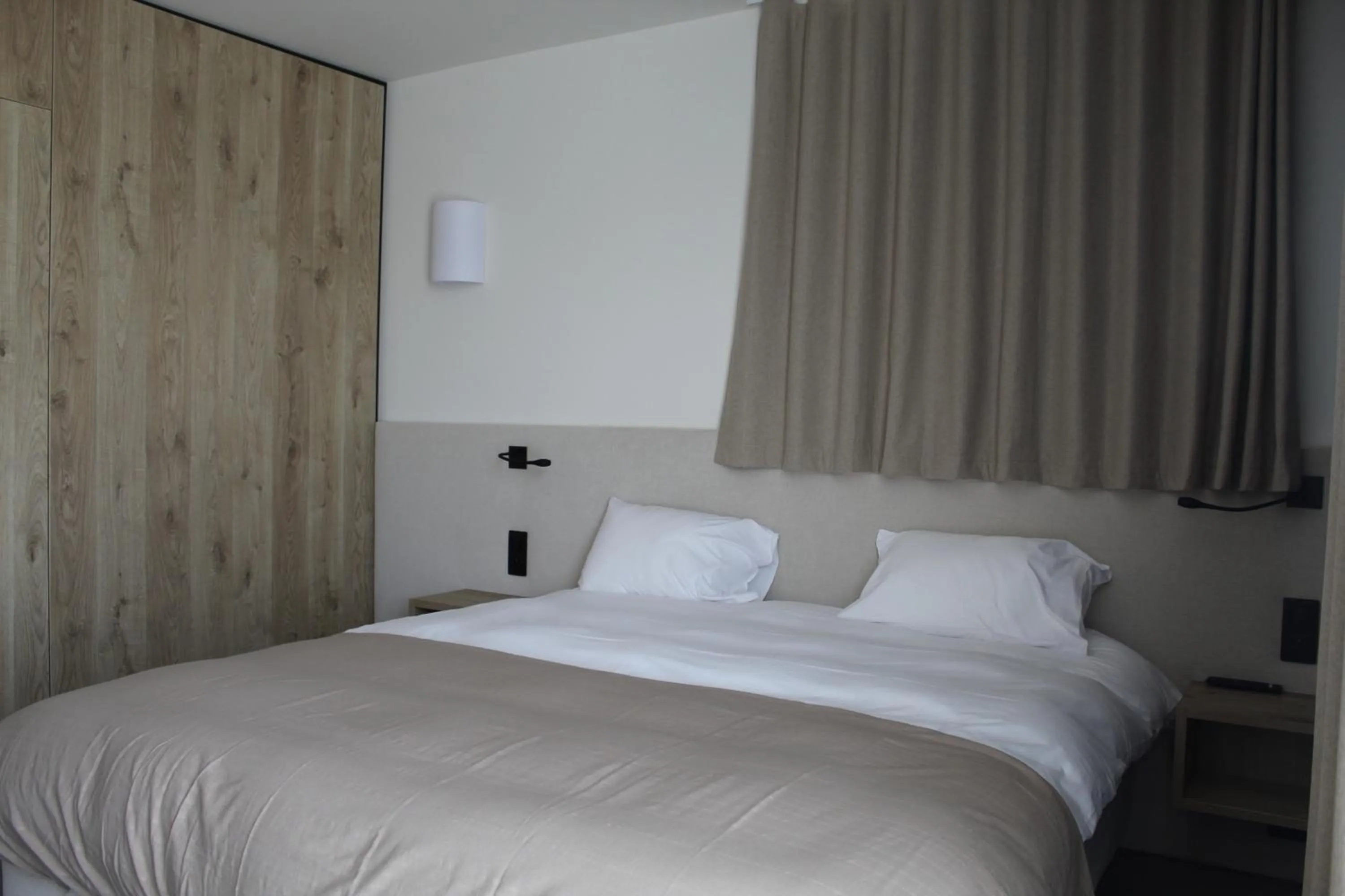 Bed in Hôtel Les Muses