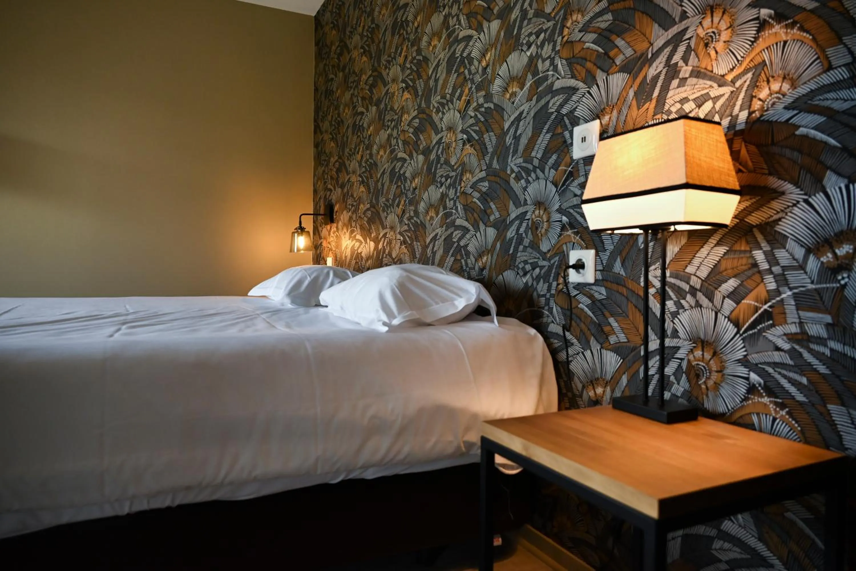 Bed in Hôtel Les Muses