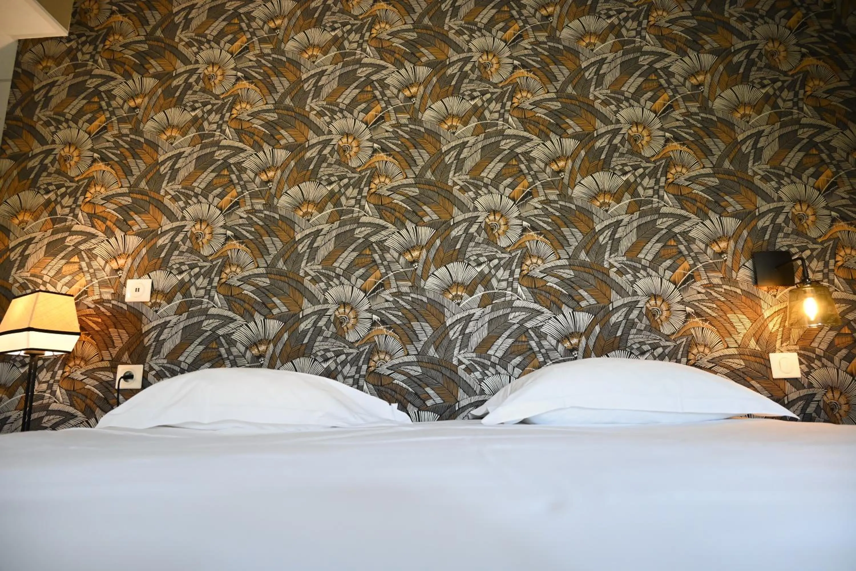 Bed in Hôtel Les Muses