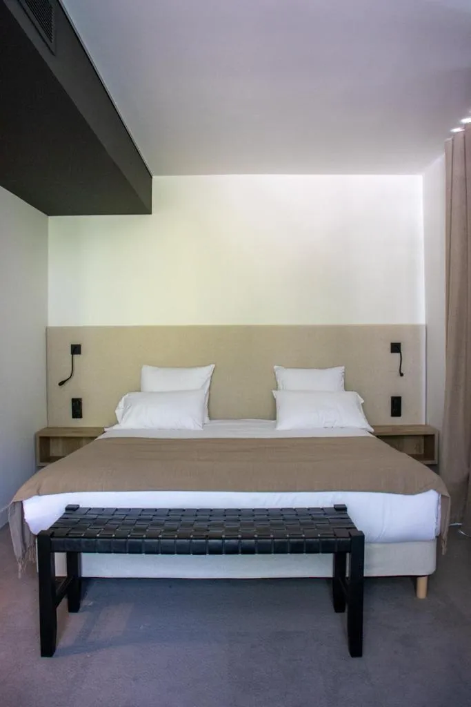 Bed in Hôtel Les Muses