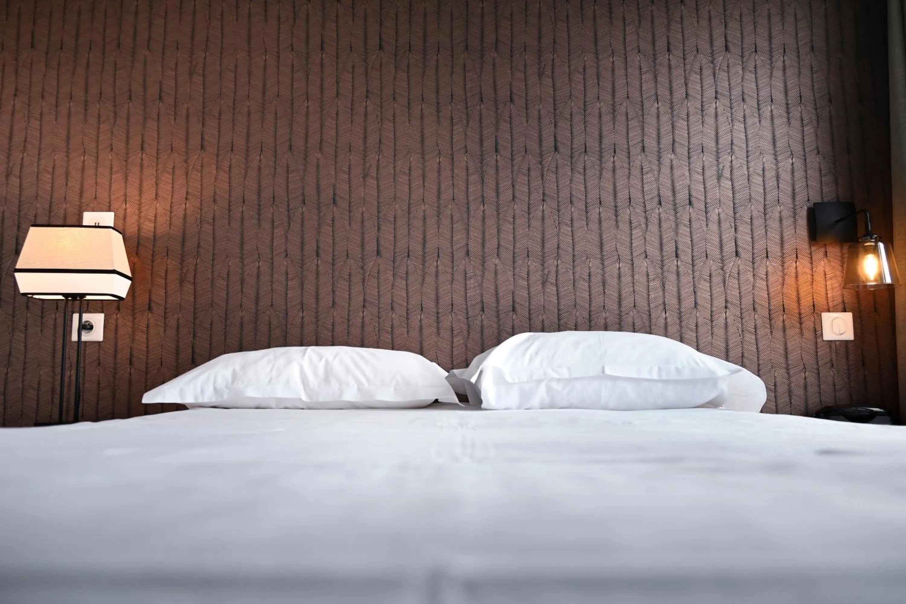 Bed in Hôtel Les Muses