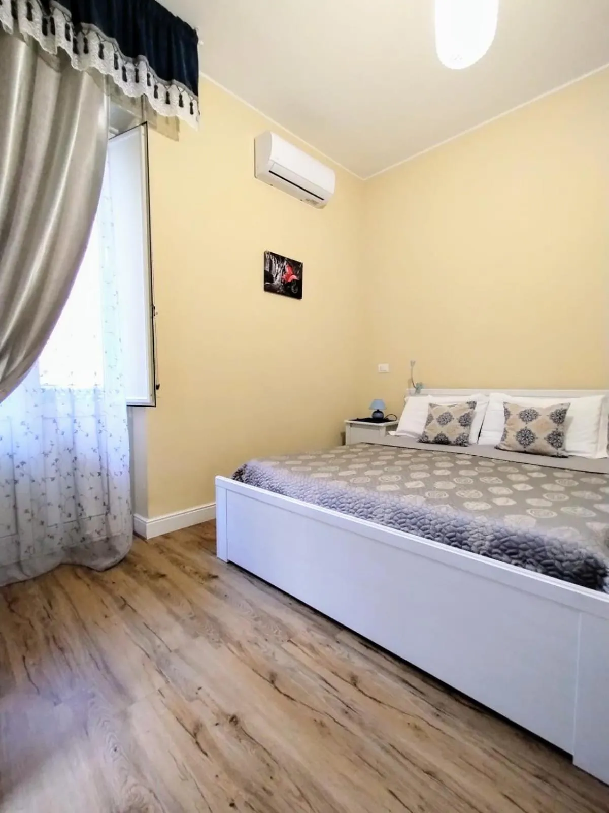 Photo of the whole room, Bed in Al Quadrato D'Oro rooms