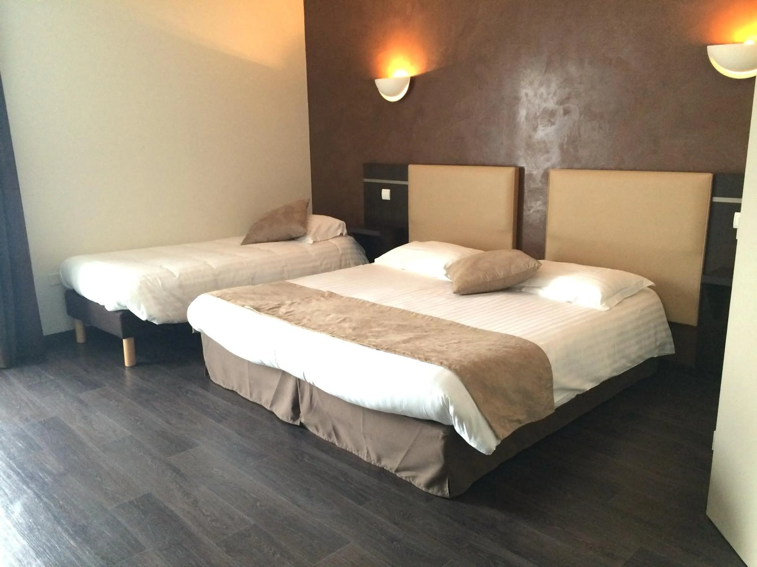 Bed in Hôtel-Restaurant Le Calice Du Gevaudan - A75