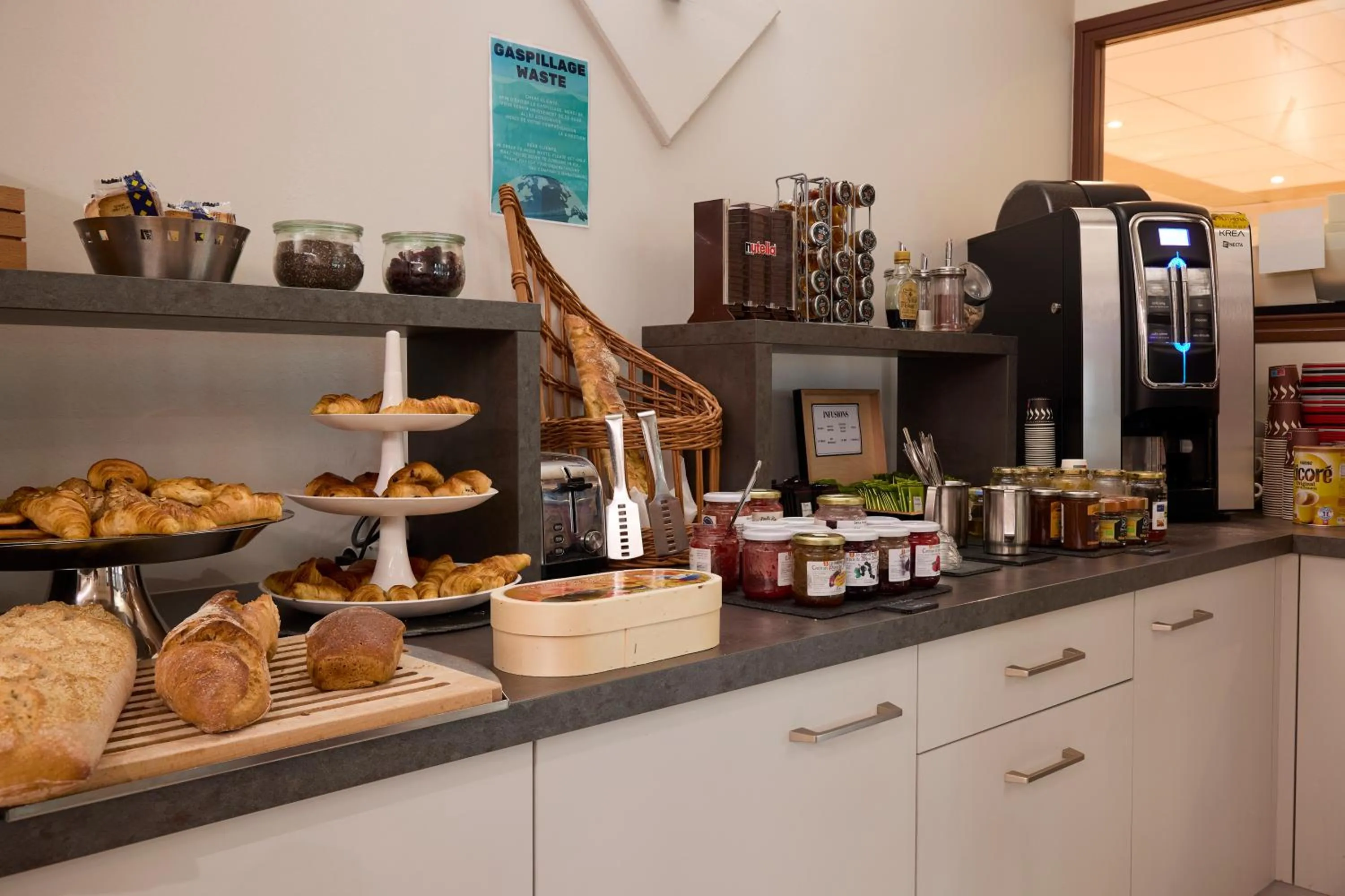 Buffet breakfast in Hôtel-Restaurant Le Calice Du Gevaudan - A75