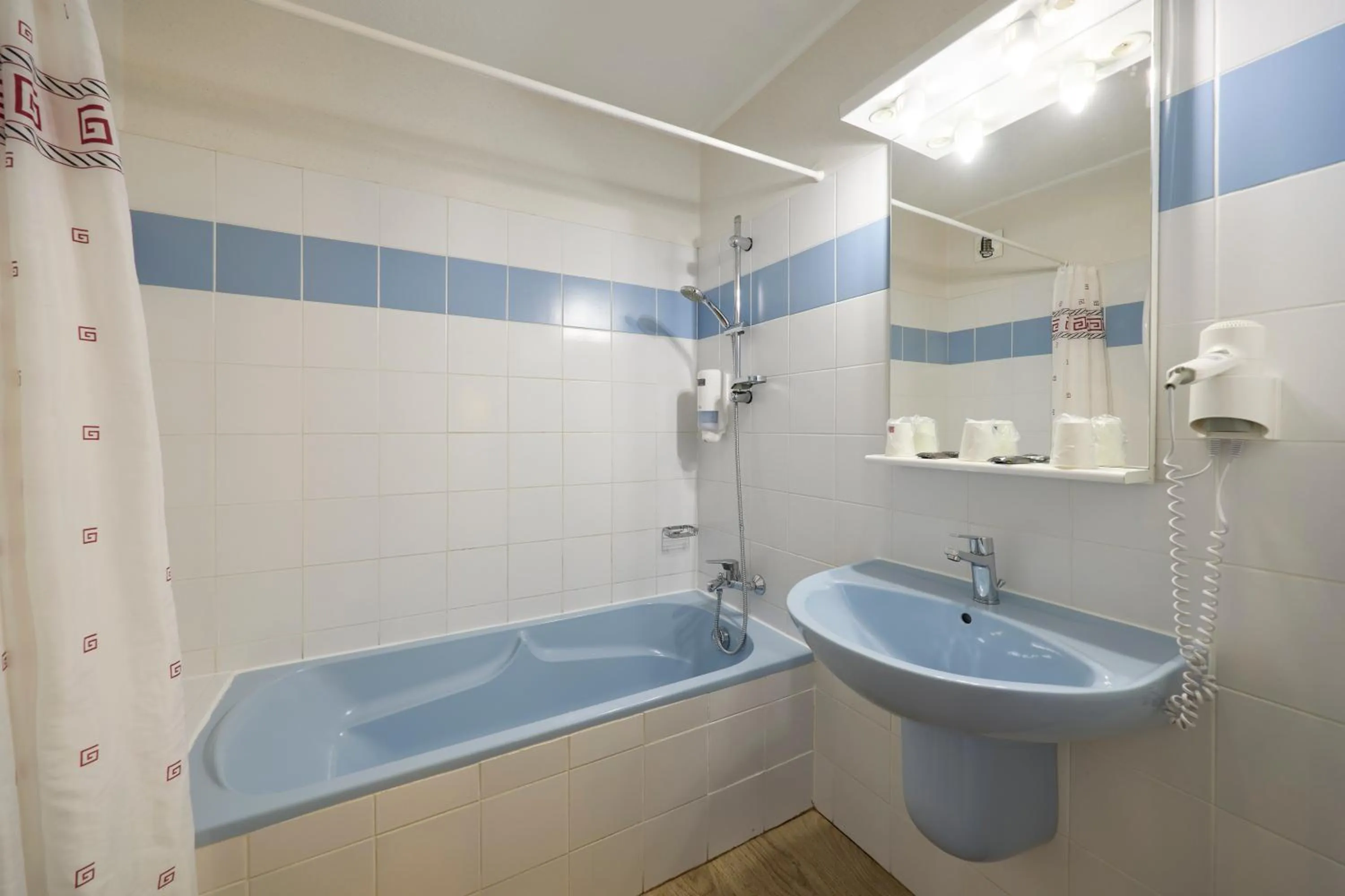 Bathroom in Hôtel-Restaurant Le Calice Du Gevaudan - A75