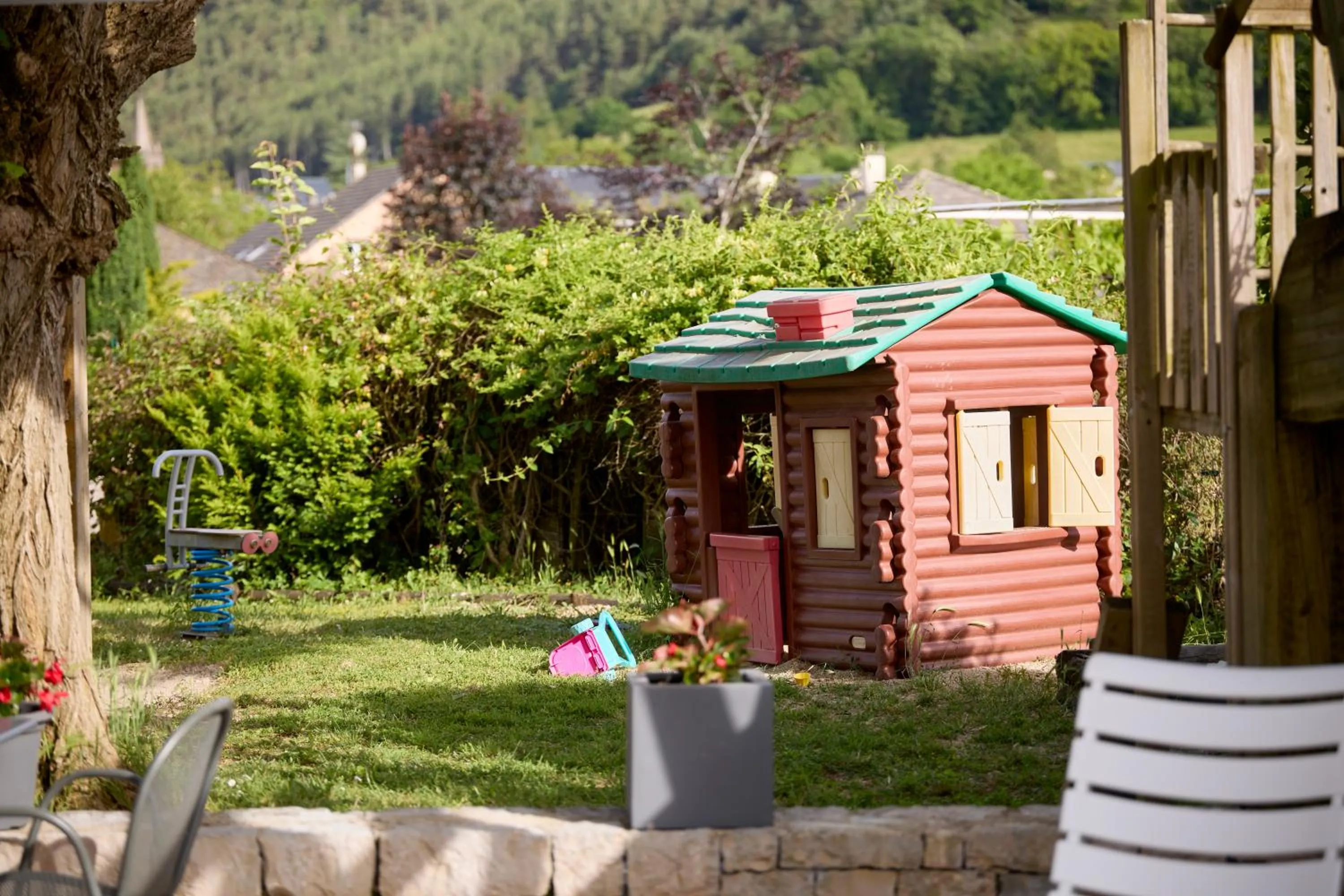 Children play ground in Hôtel-Restaurant Le Calice Du Gevaudan - A75