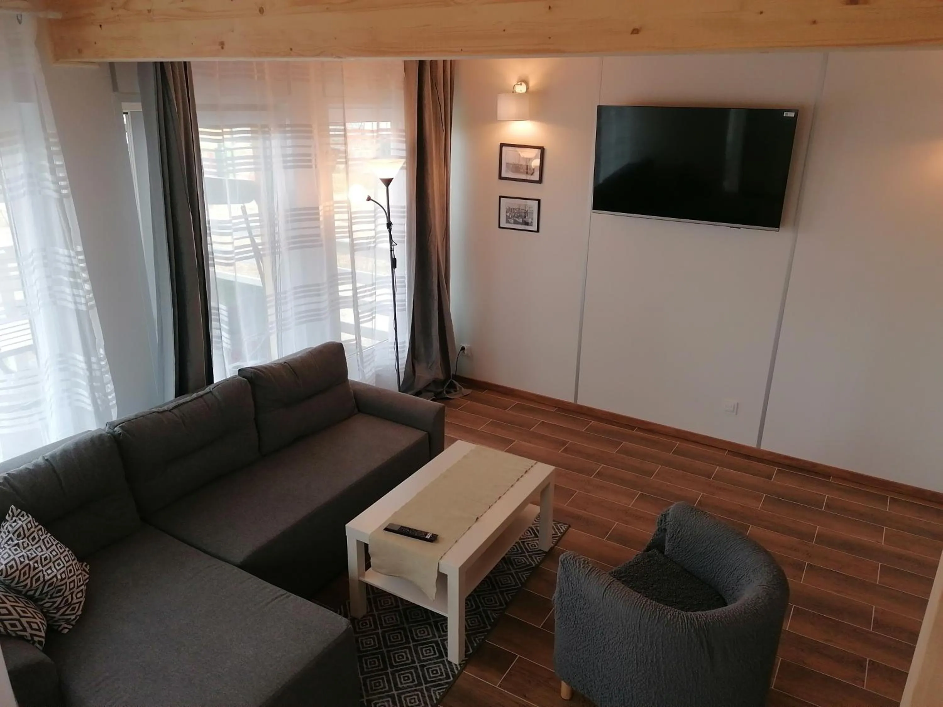 Communal lounge/ TV room in Domki Grażyna