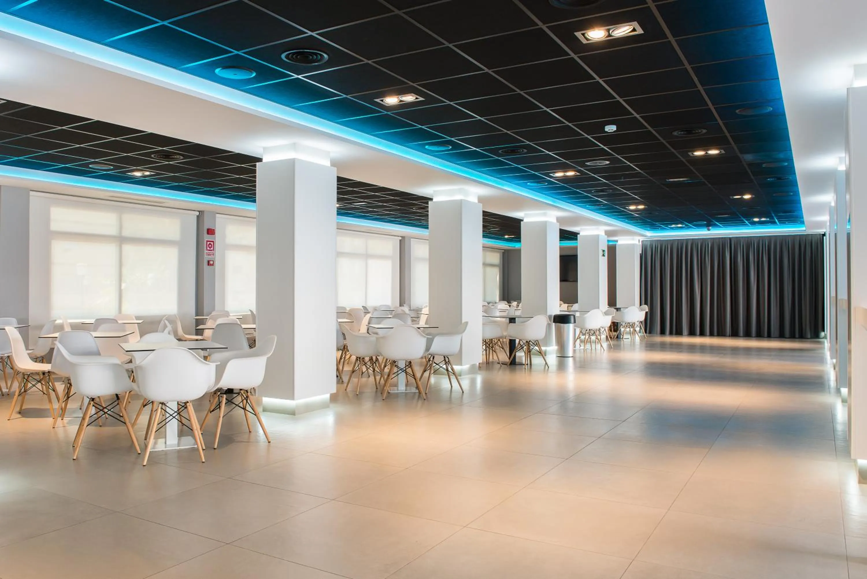 Communal lounge/ TV room in Hotel Melina