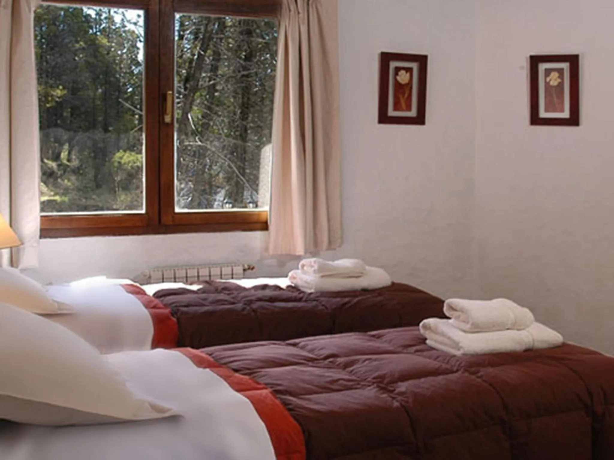 Photo of the whole room, Bed in HTL La Malinka