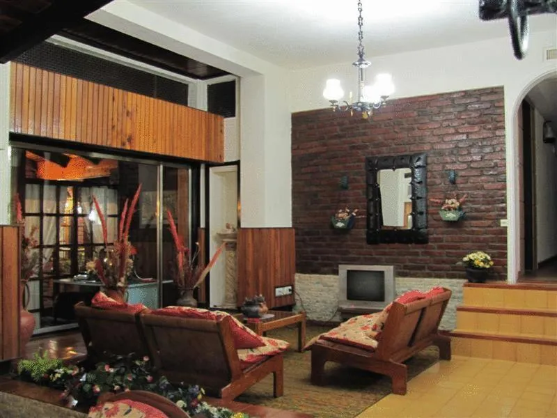 Communal lounge/ TV room in Ruca Cheli Village Ski Hotel