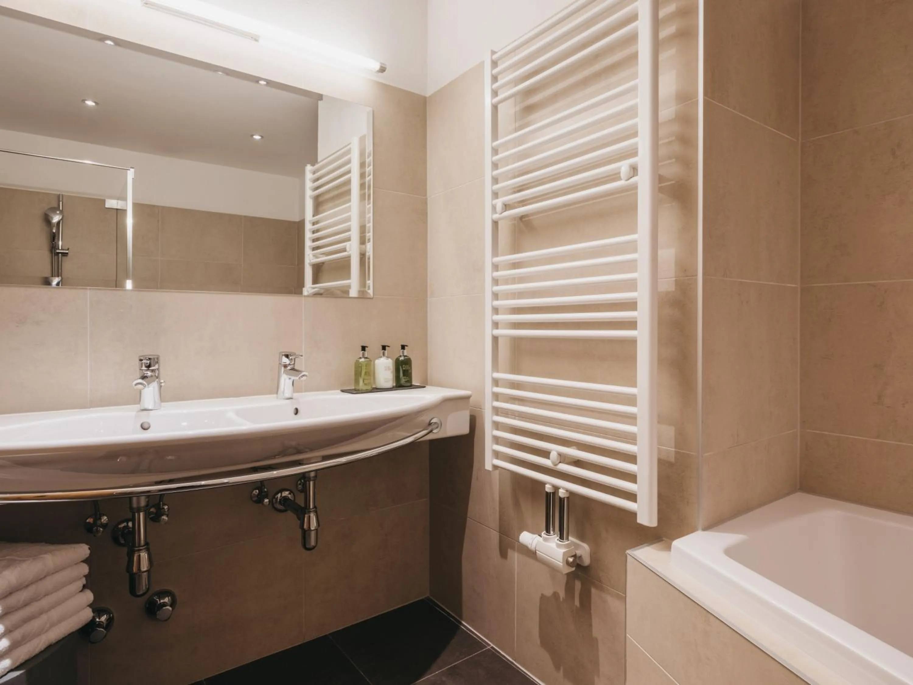 Bathroom in Hotel Vier Jahreszeiten by VAYA