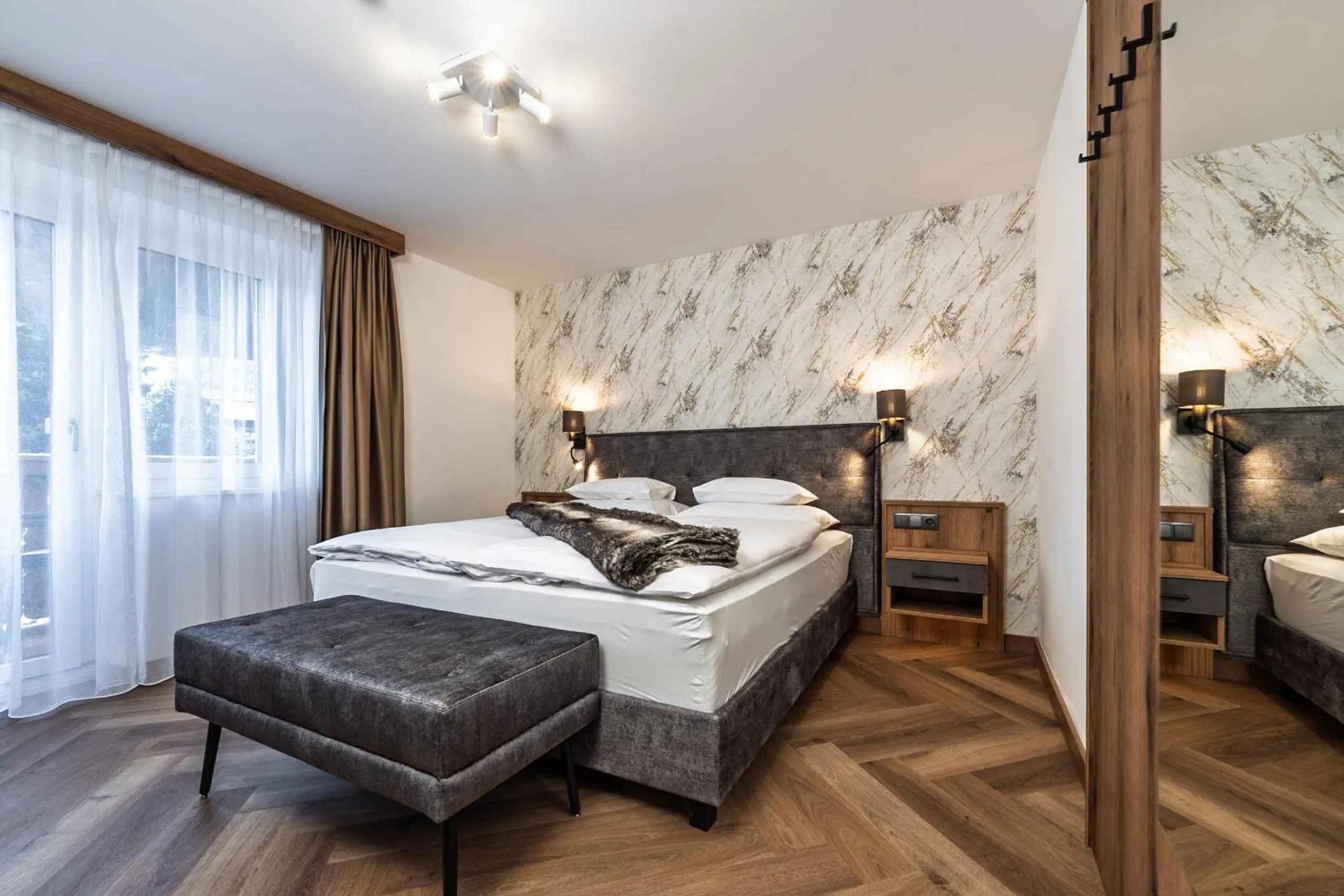 Bed in Hotel Vier Jahreszeiten