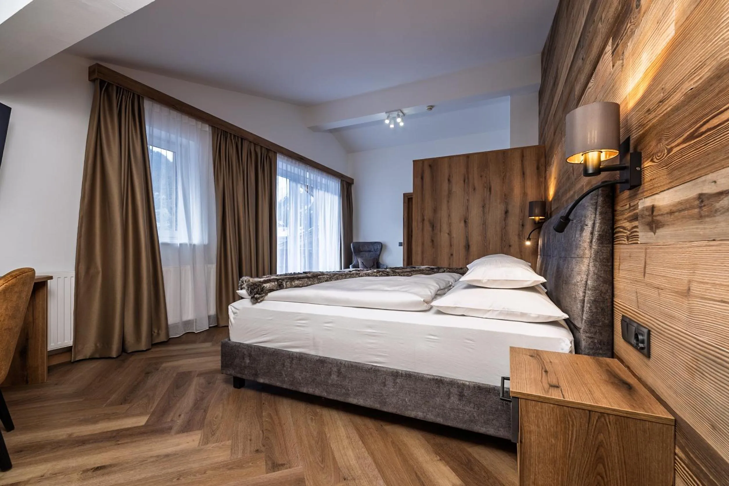 Bed in Hotel Vier Jahreszeiten