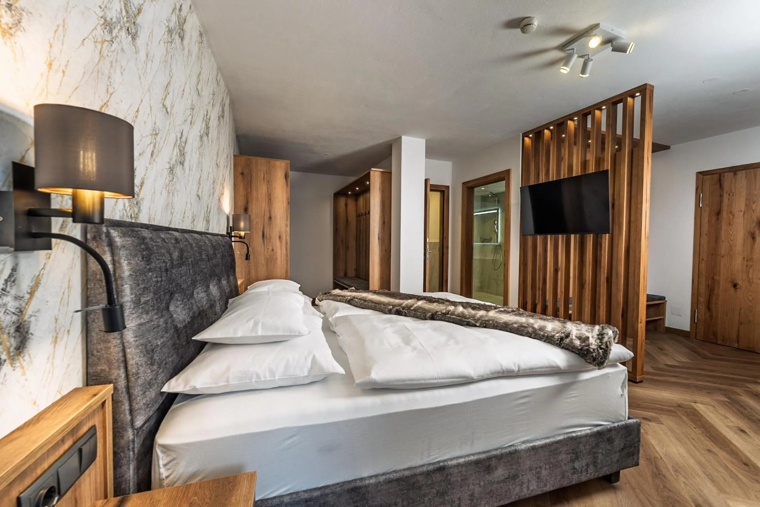 Bed in Hotel Vier Jahreszeiten