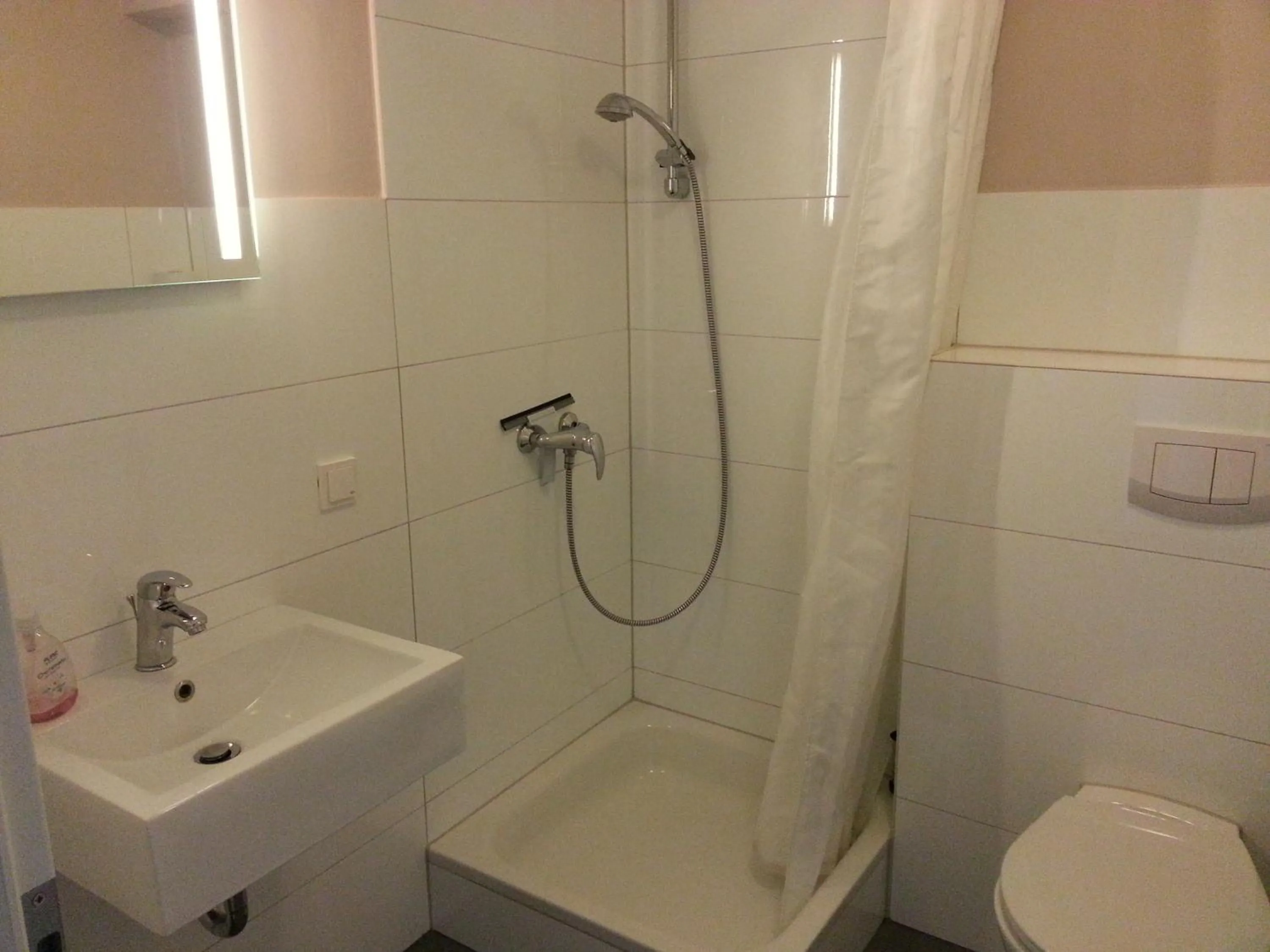 Shower in Appartements Fischerhus