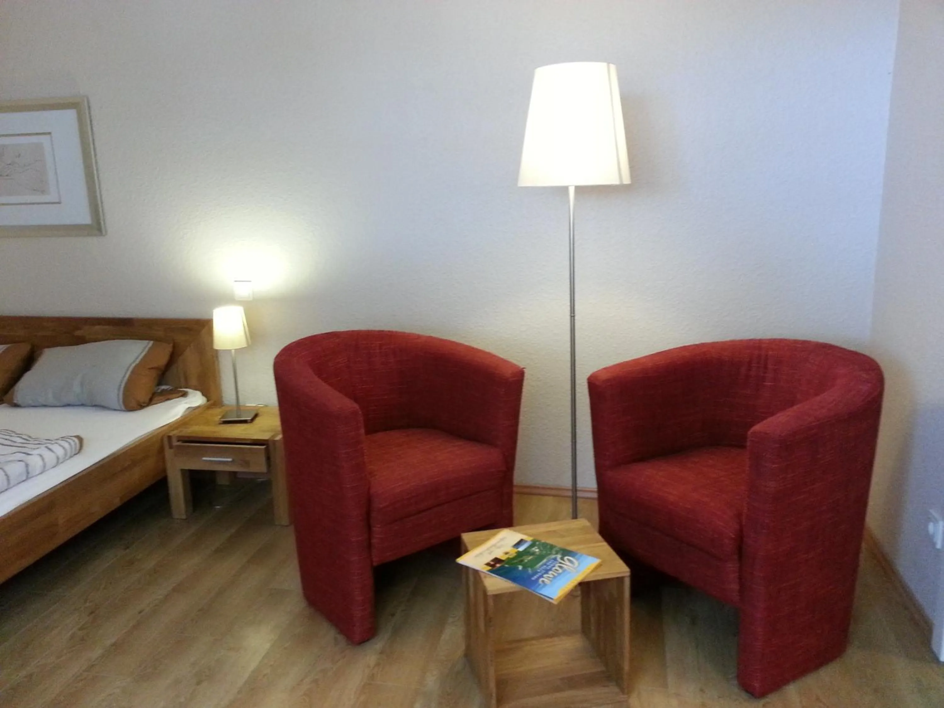 Seating area, Bed in Appartements Fischerhus