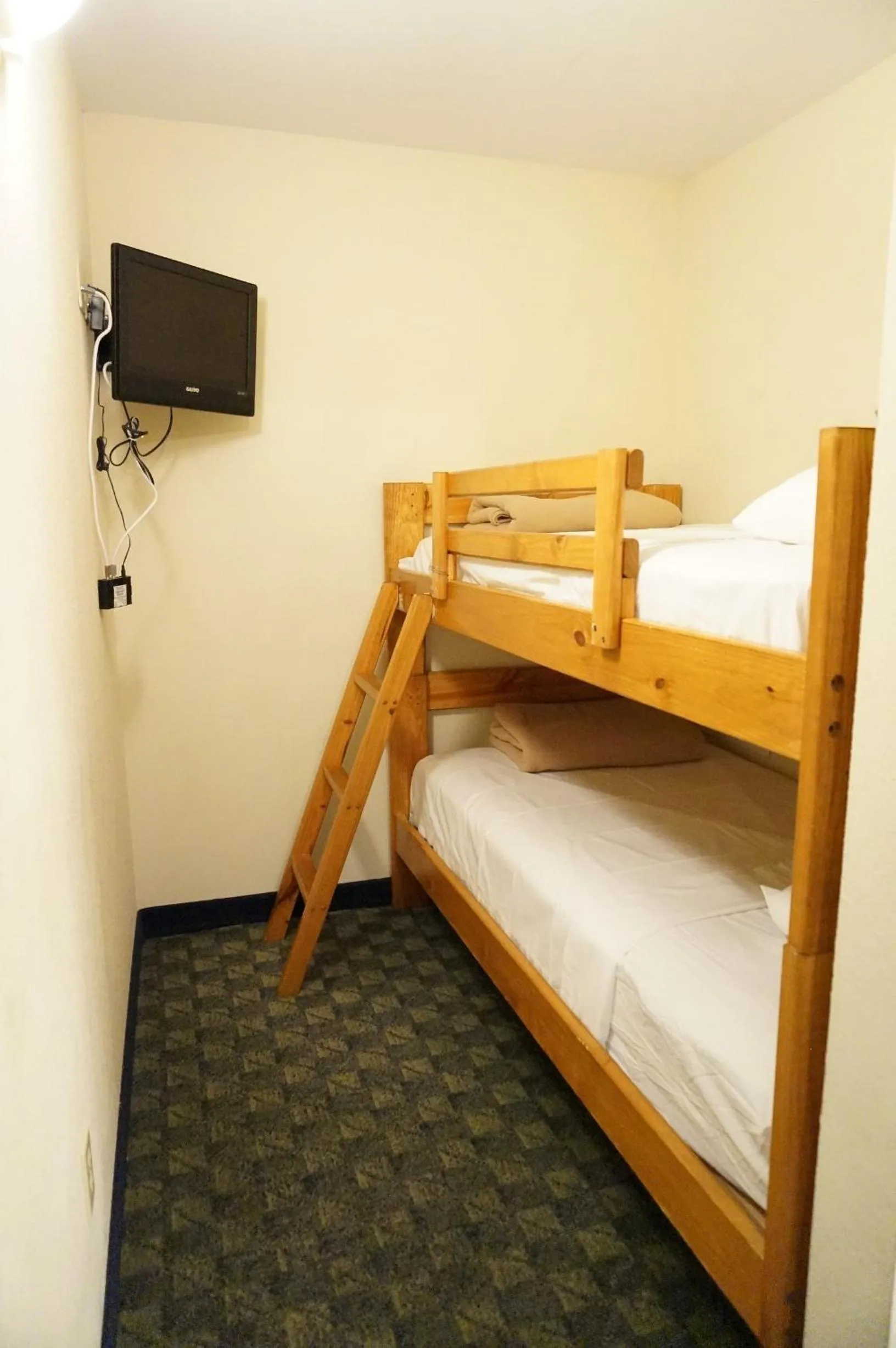 Bed in Howard Johnson by Wyndham Branson