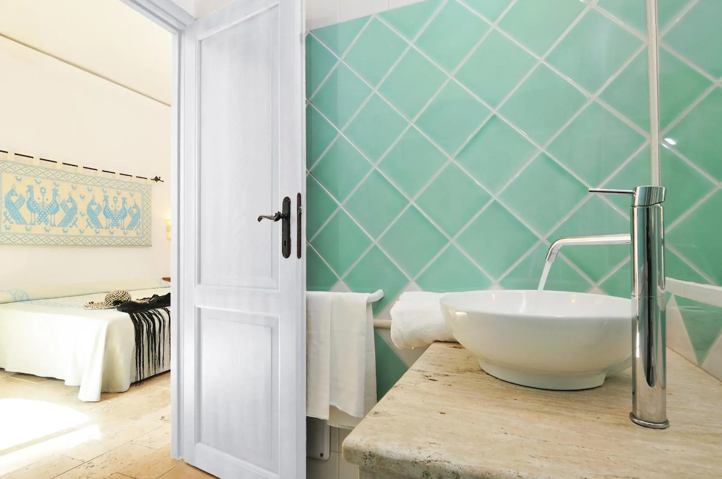 Bathroom, Bed in Arbatax Park Resort - Telis Bathroom, Bed in Arbatax Park Resort - Telis