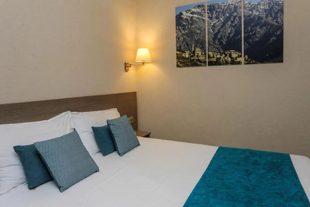 Bed in Hôtel Duc De Padoue