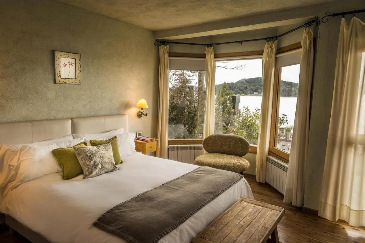 Bed in Lirolay Suites - Apart Hotel