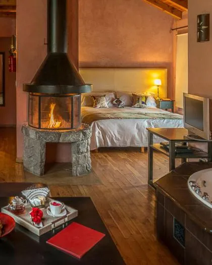 Bed in Lirolay Suites - Apart Hotel