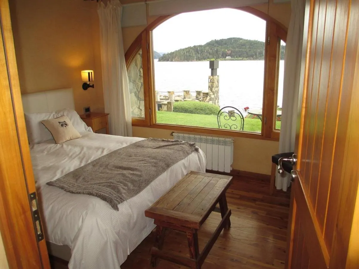 Bed in Lirolay Suites - Apart Hotel