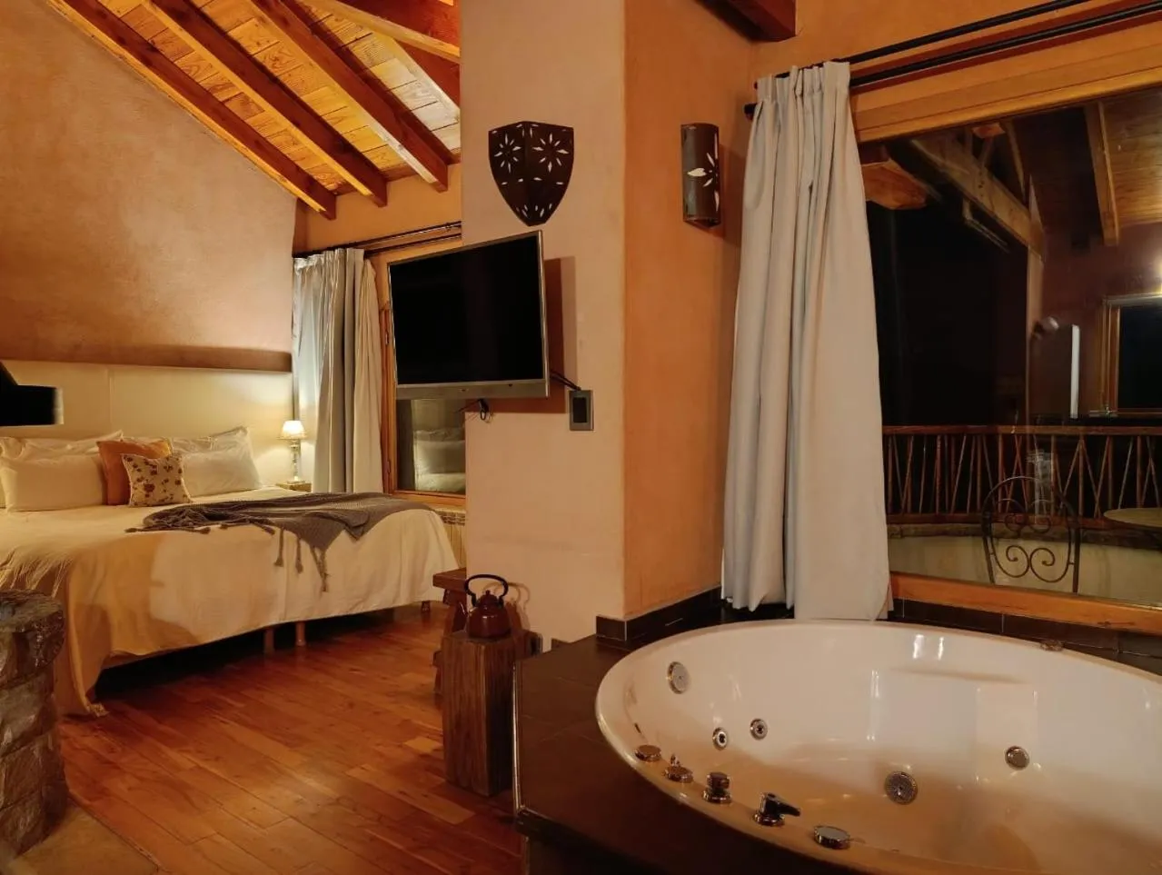 Bed in Lirolay Suites - Apart Hotel