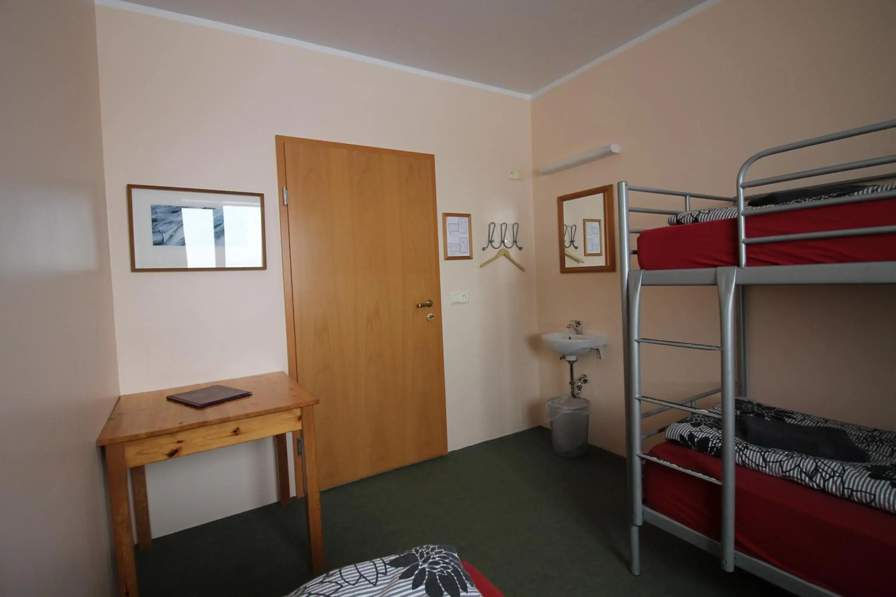 Standard Triple Room in Hvoll Hostel Standard Triple Room in Hvoll Hostel